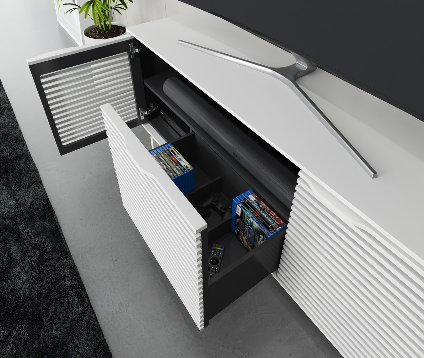 Top-down view of open Align Triple Cabinet displaying internal shelves and media storage