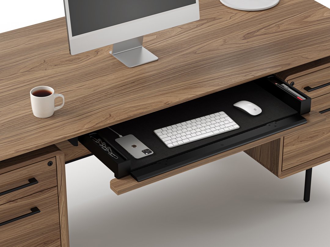 LINQ Executive Desk with extended keyboard tray, desktop monitor, and coffee mug in workspace setup
