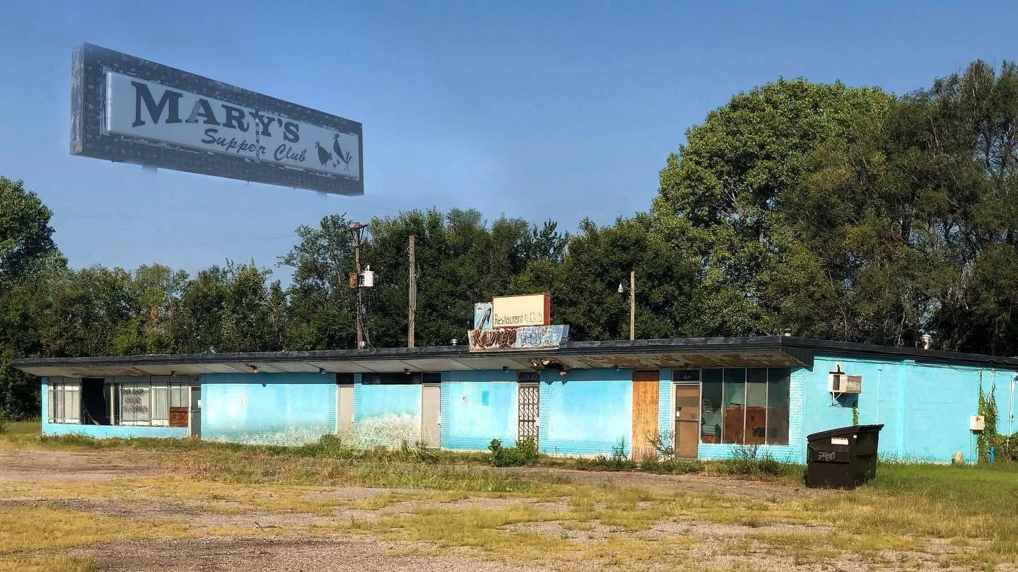 An abandoned, single-story, turquoise building with broken windows and overgrown grass in front. A large billboard for Mary's Supper Club is visible on the roof, and there is a sign for a restaurant and lounge on top of the building.