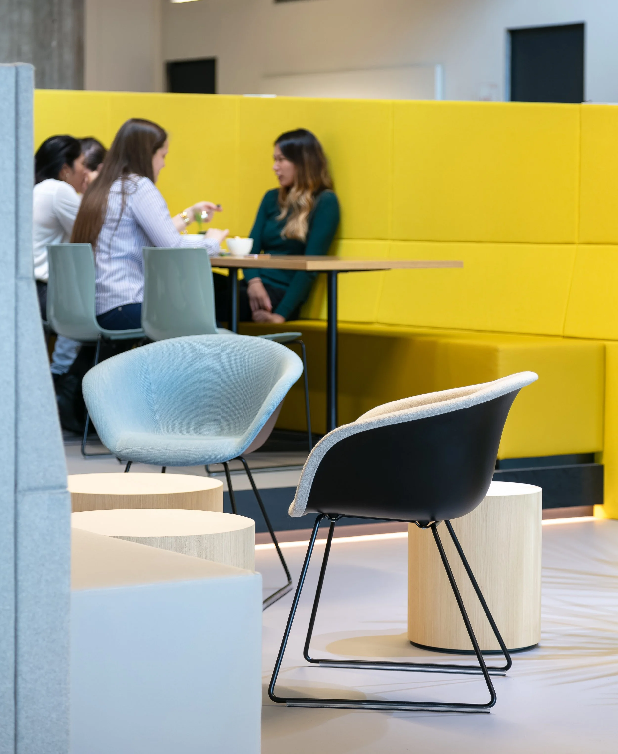 Office canteen with yellow feature wall at Yuki HQ, Rotterdam, designed by Meeder Ontwerpers.