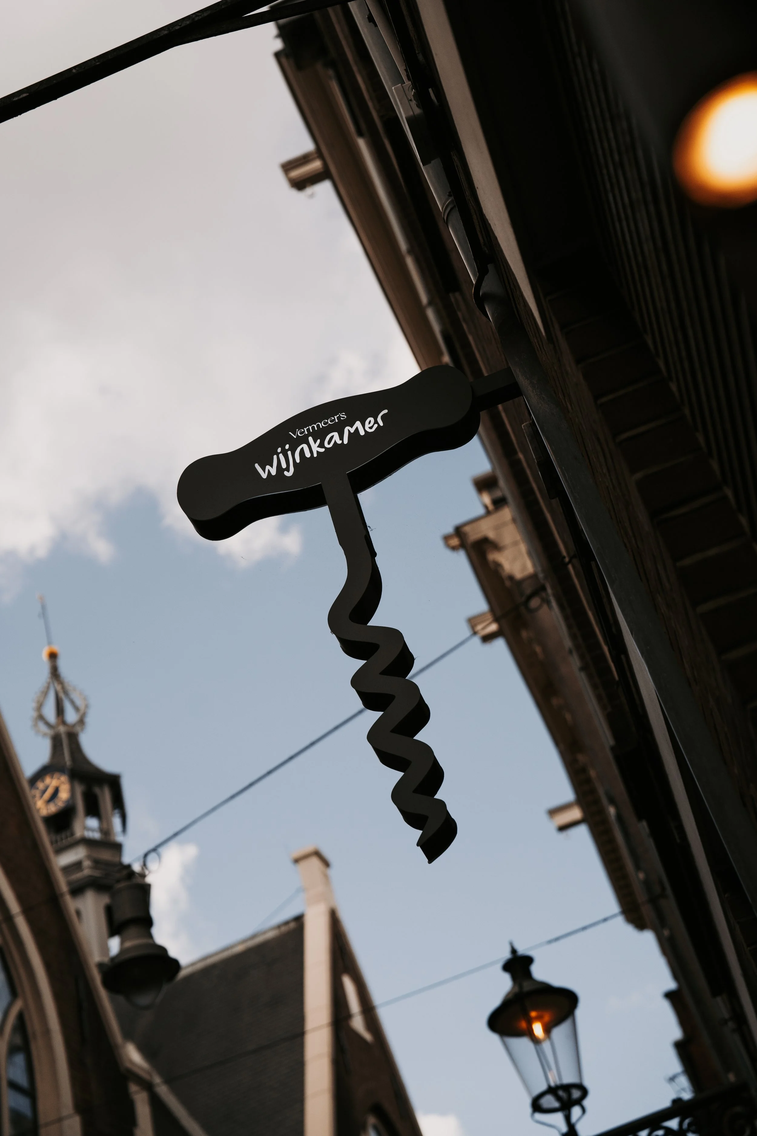 Facade with Vermeers Wijnkamer logo at NH Barbizon Palace, Amsterdam, redesigned by Meeder Ontwerpers X Studio Michiel Wijnen.