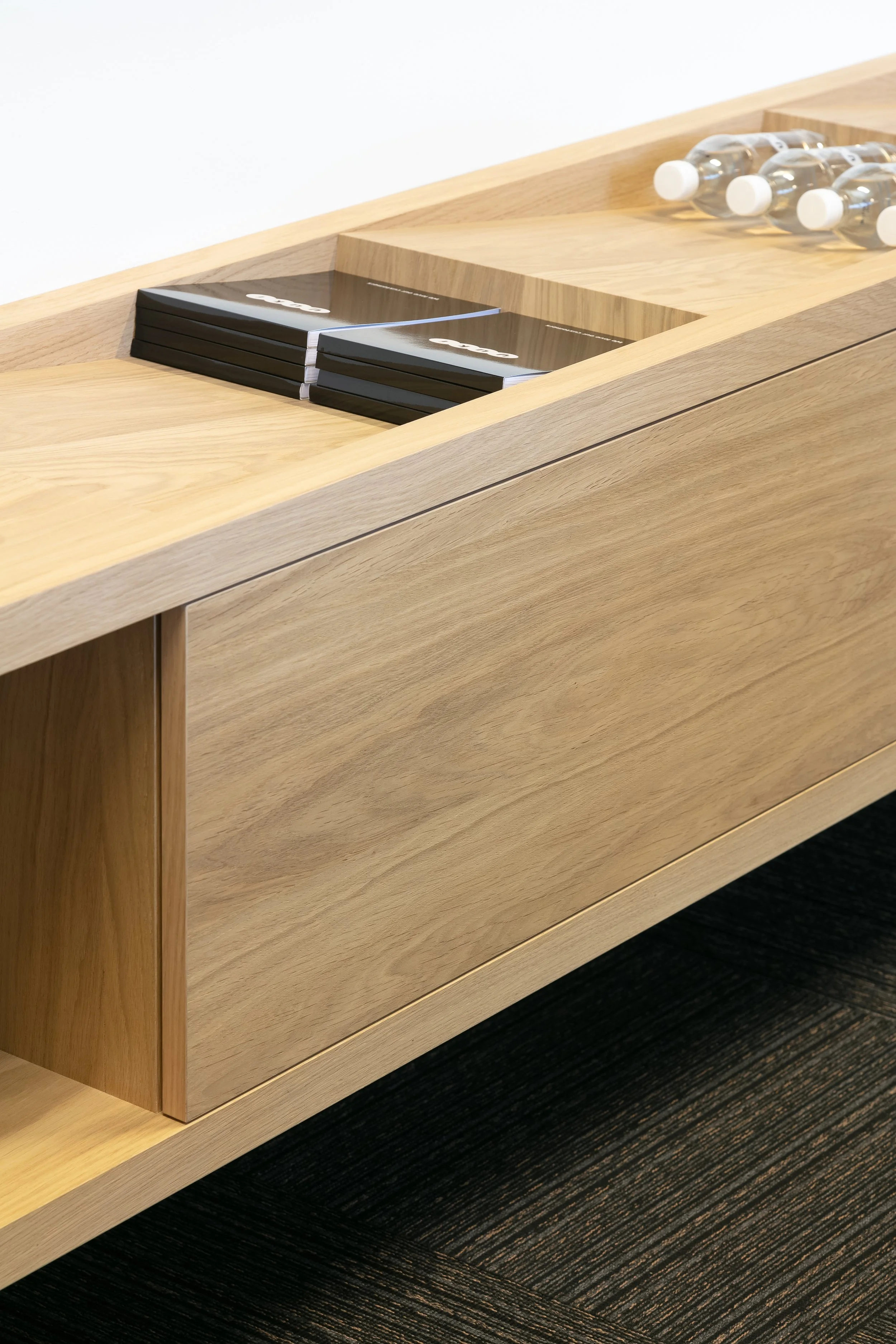 Sideboard with merchandise display at Yuki HQ office, Rotterdam, designed by Meeder Ontwerpers.