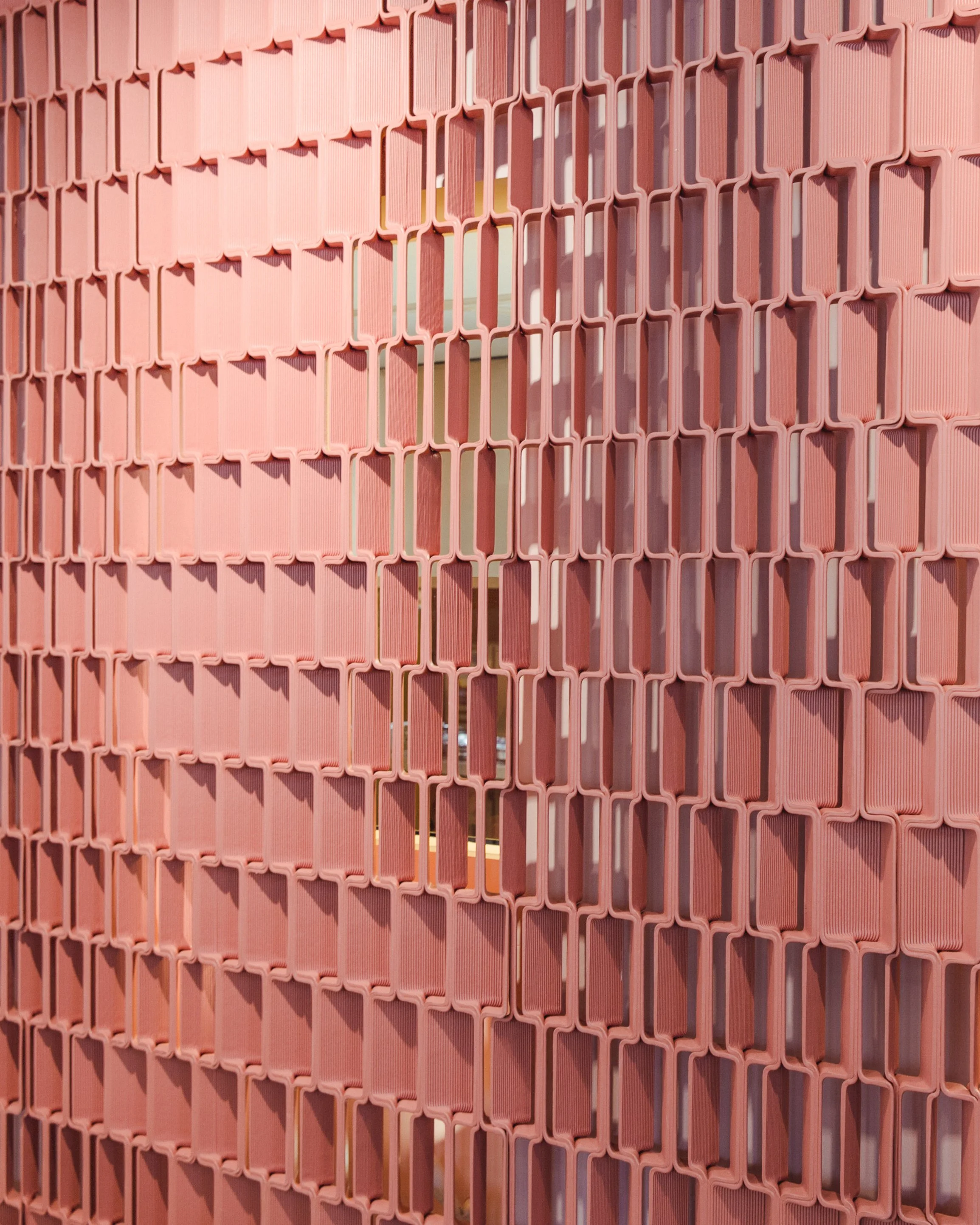 Nazka Screen, a terra-cotta 3D printed circular room divider designed by Meeder Ontwerpers X Studio Michiel Wijnen.