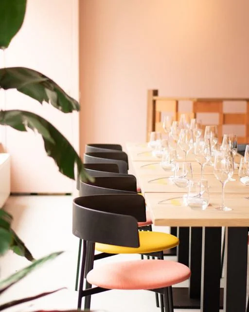 Dining tables with plant detail at Restaurant Nazka, Amsterdam, designed by Meeder Ontwerpers.