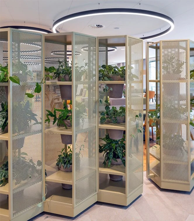 Plant cart room divider in gold finish at The Tasting Room, Rabobank Headquarters Utrecht, designed by Meeder Ontwerpers X OIII Architecten.
