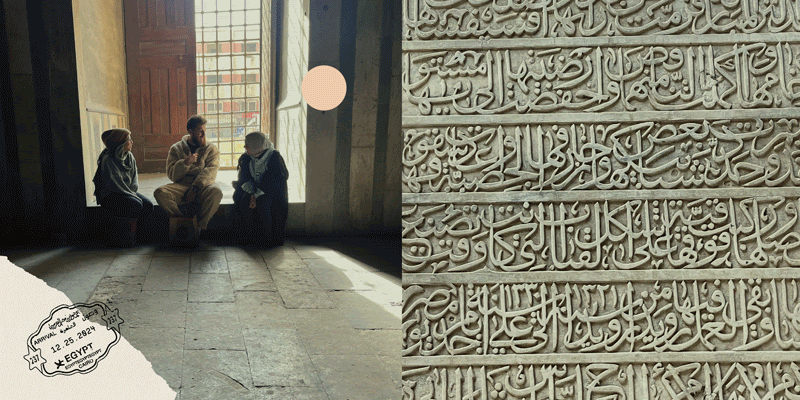 Three people sitting and talking indoors, with natural light coming through large windows, and intricate Arabic calligraphy carved into a stone wall.
