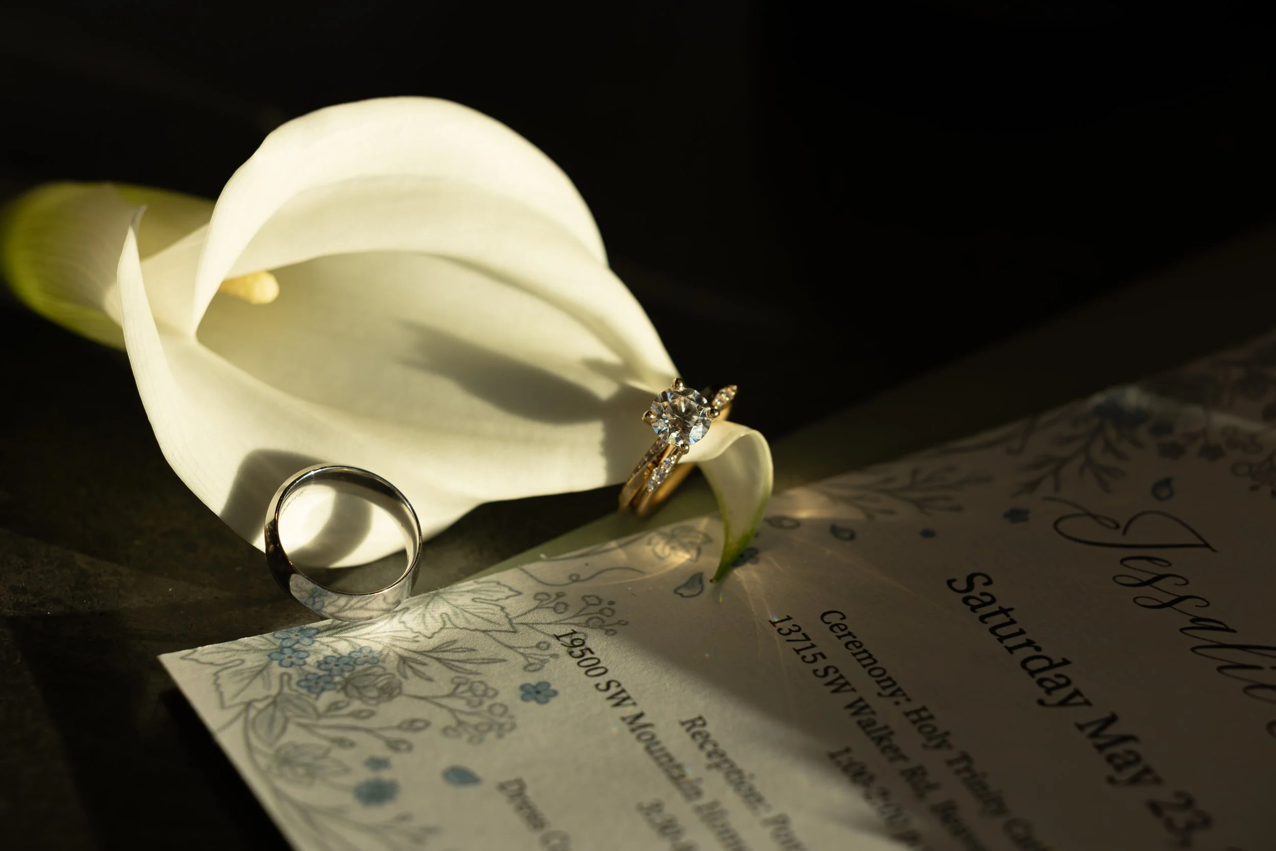 Wedding Details photography. Elevated, Luxury wedding photographer, calla lily, rings, invitation using natural light. Wedding details inspiration.