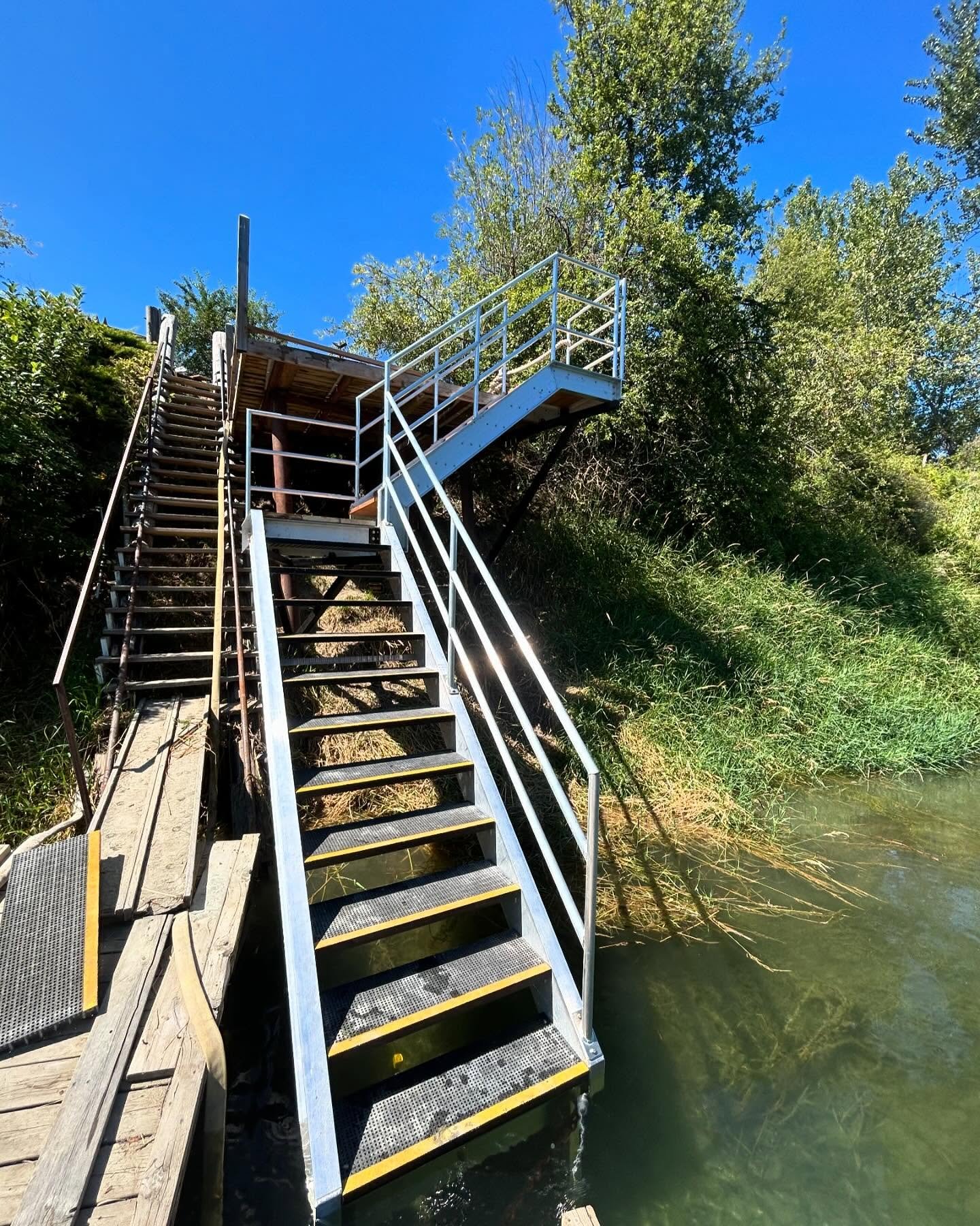 Our most challenging install yet! This cantilevered staircase was built off of some non-plumb existing pilings on a bank, and everything else was pre fabricated off site using a cad drawing-right down to the copes in the square tubing. Thanks for the