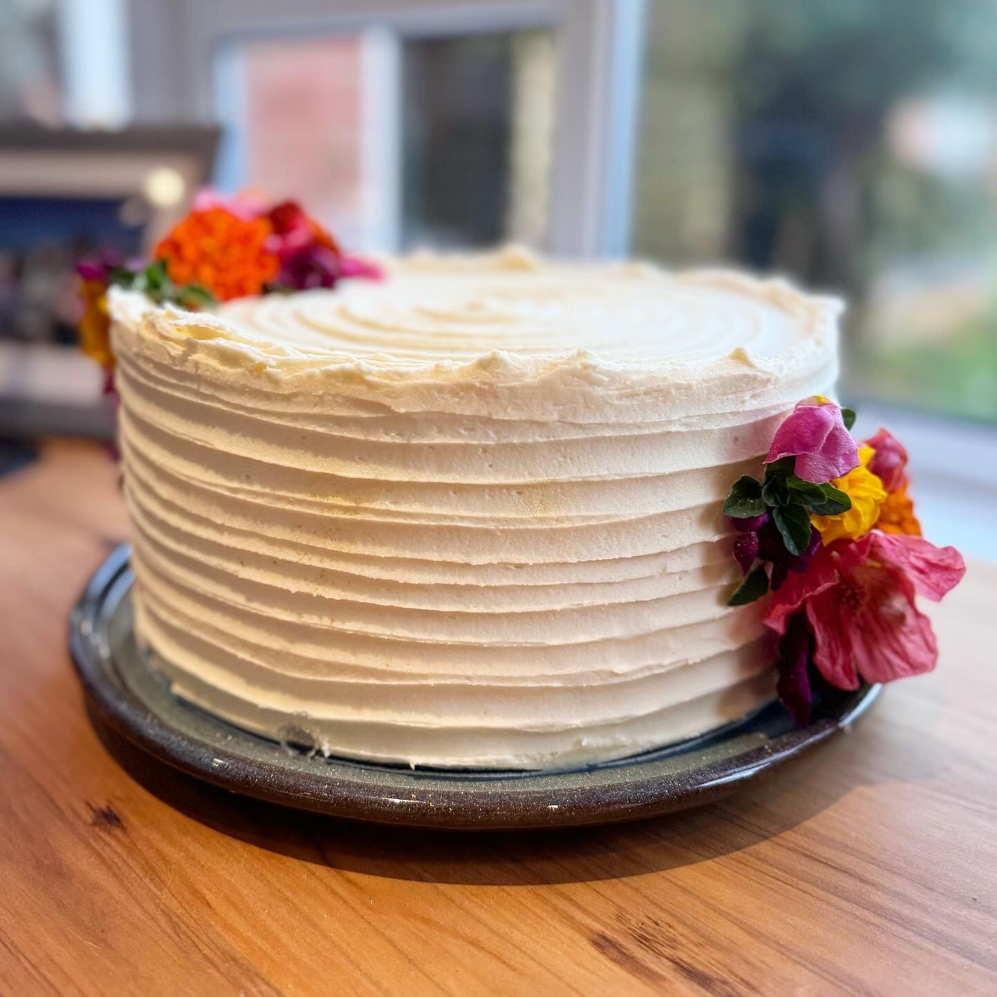 Lemon sponge cake filled with homemade lemon curd and raspberry jam.