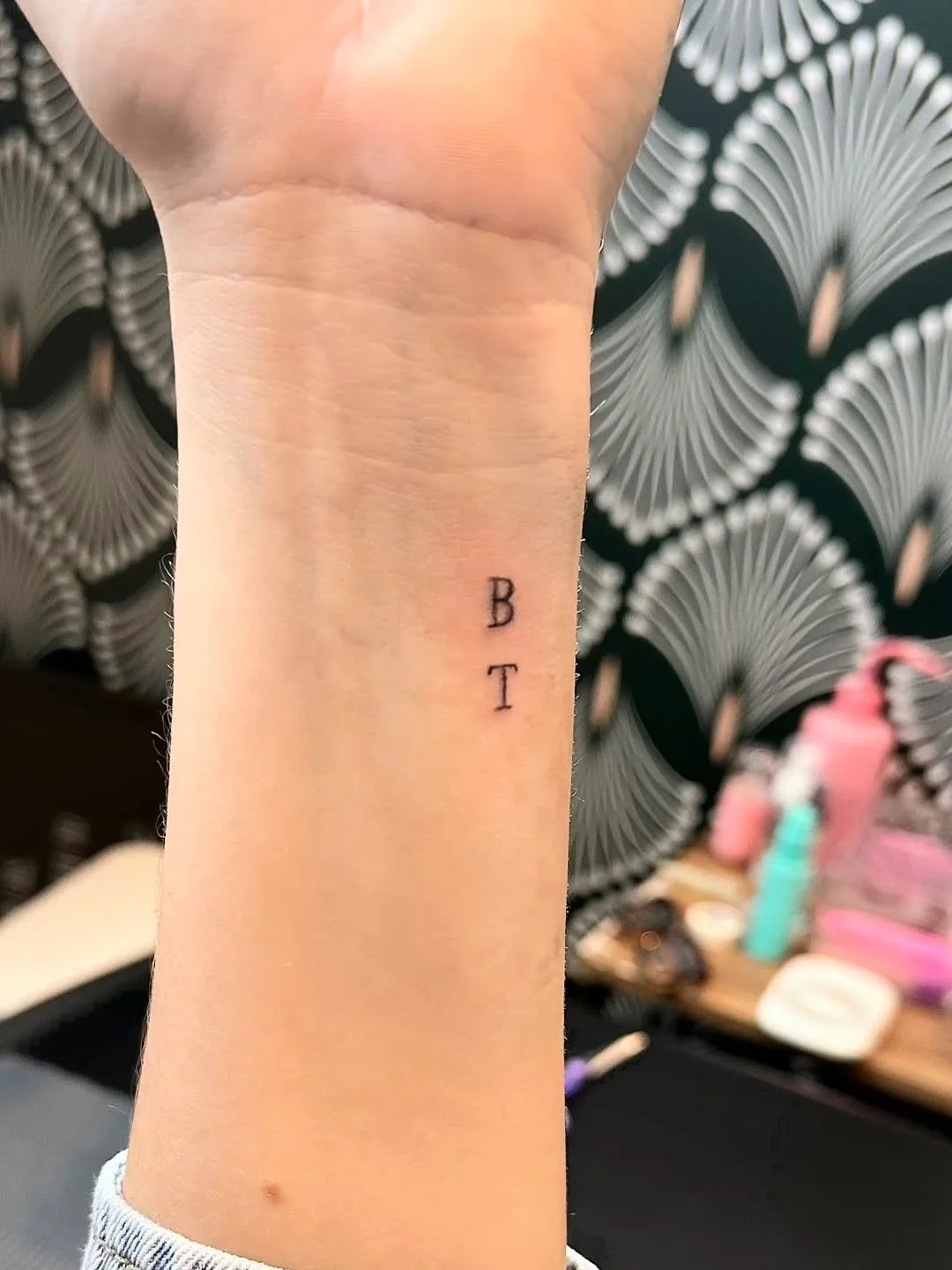 Beautiful initial tattoo by Sydni @sydnilashandbeauty 💙
Sydni will be doing fineline tattoos at our Sip &amp; Shop Event 11/14! 😍

Spots are limited so book your custom tattoo with her before the appointments are taken 
Call/text to book 📲 269-717
