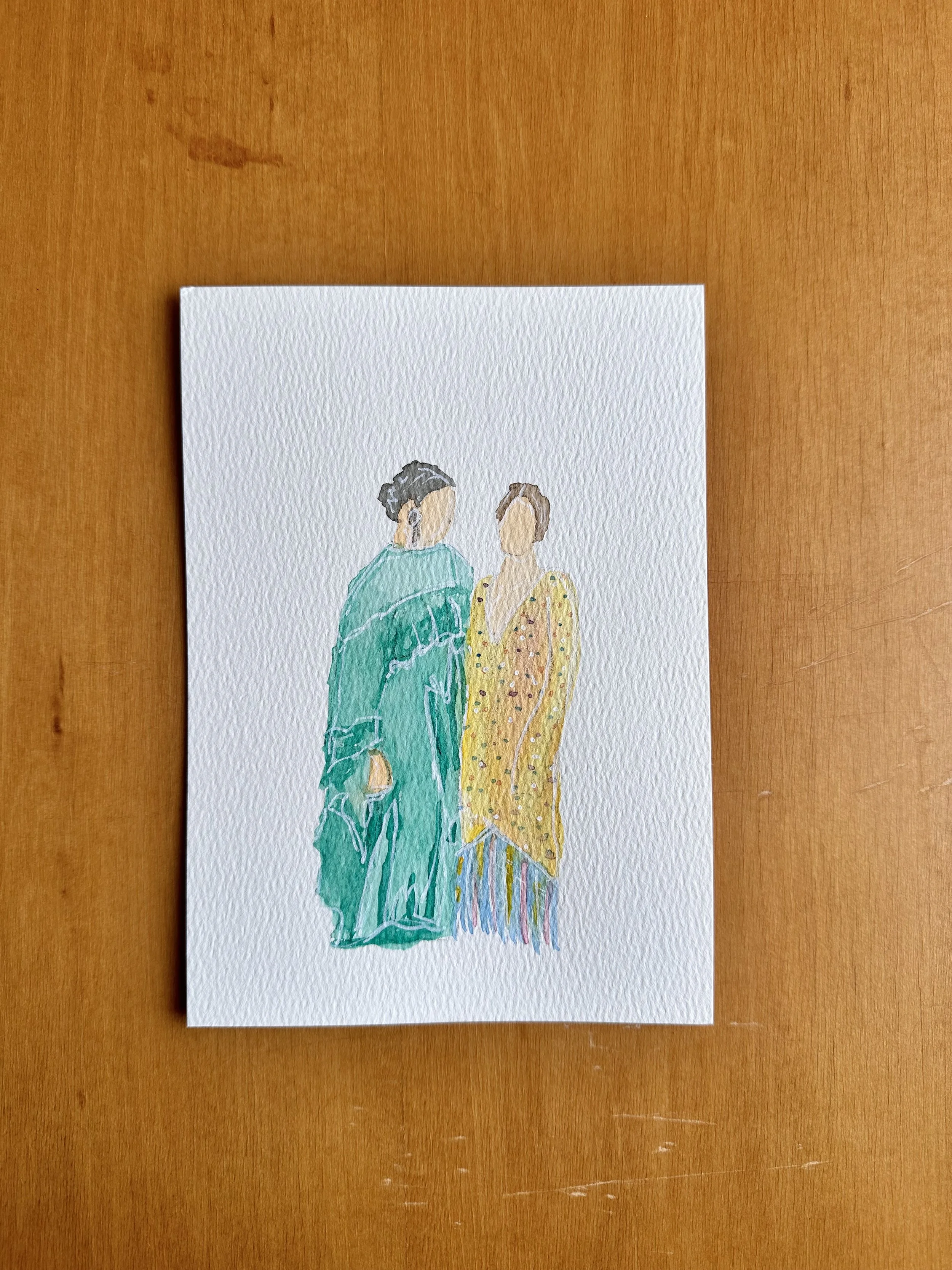 Watercolor painting of two faceless women standing side by side, one in a teal dress and the other in a yellow dress with colorful details, on a textured white paper background.