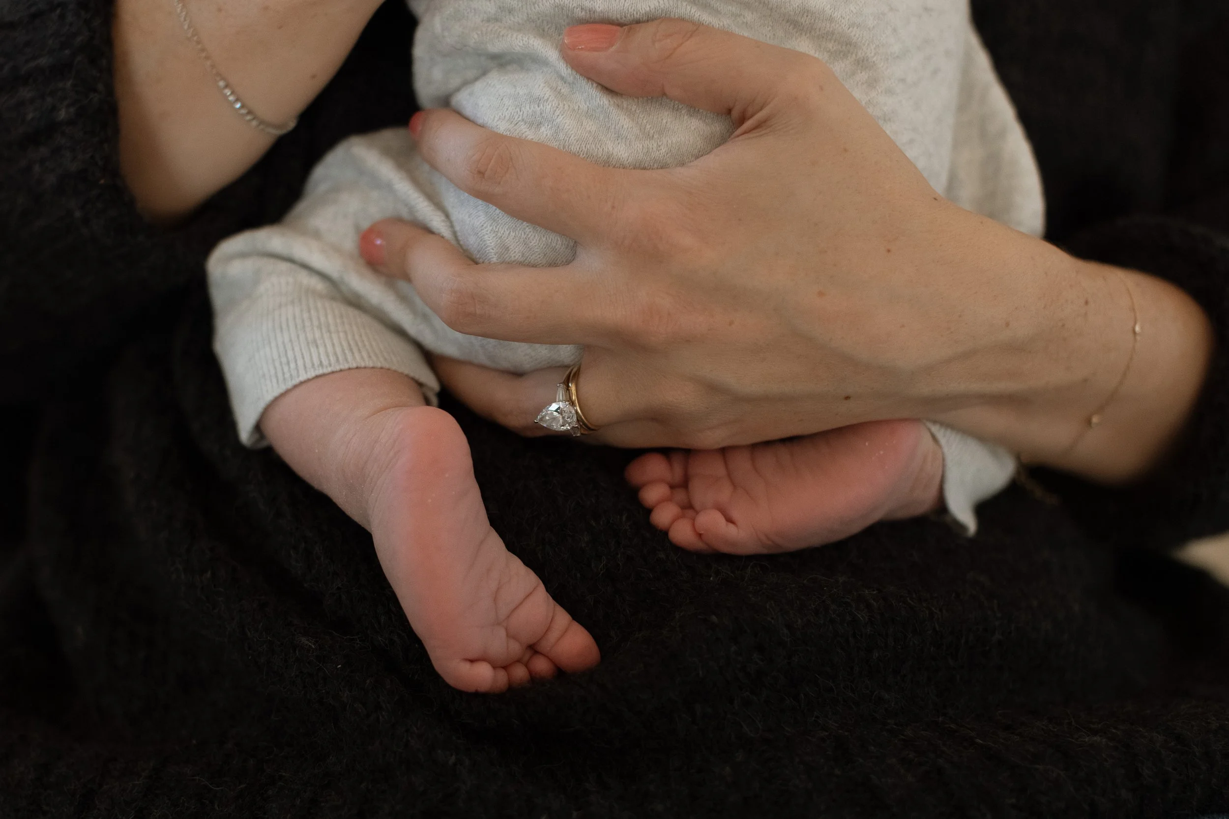 sacramento in home newborn photograph of mother and newborn baby