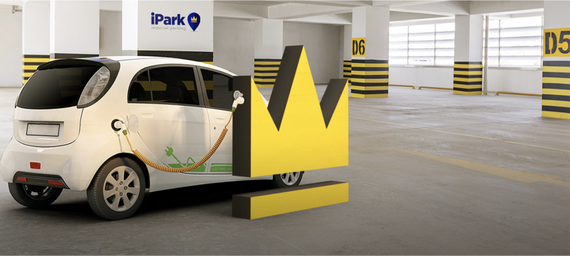 Electric vehicle charging at an iPark multilevel parking garage, positioned near yellow and black striped safety barriers, with a visible iPark sign in the background.