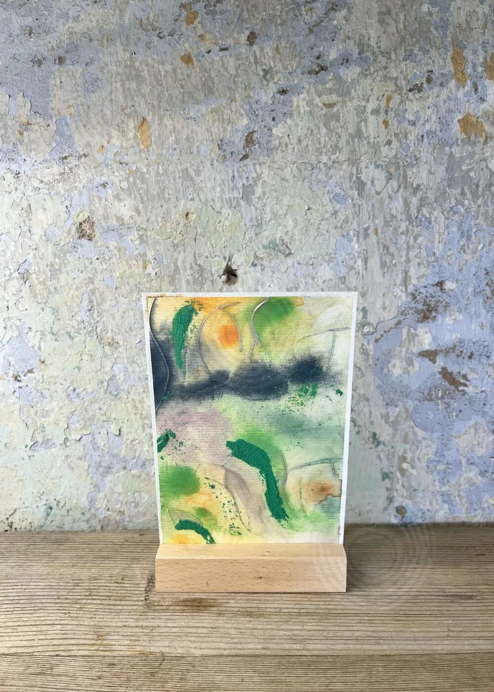 Abstract artwork ‘Where silence whispers of freedom’ – textured layers of emerald green, deep blue, and warm orange symbolizing release, inner strength, and renewal.