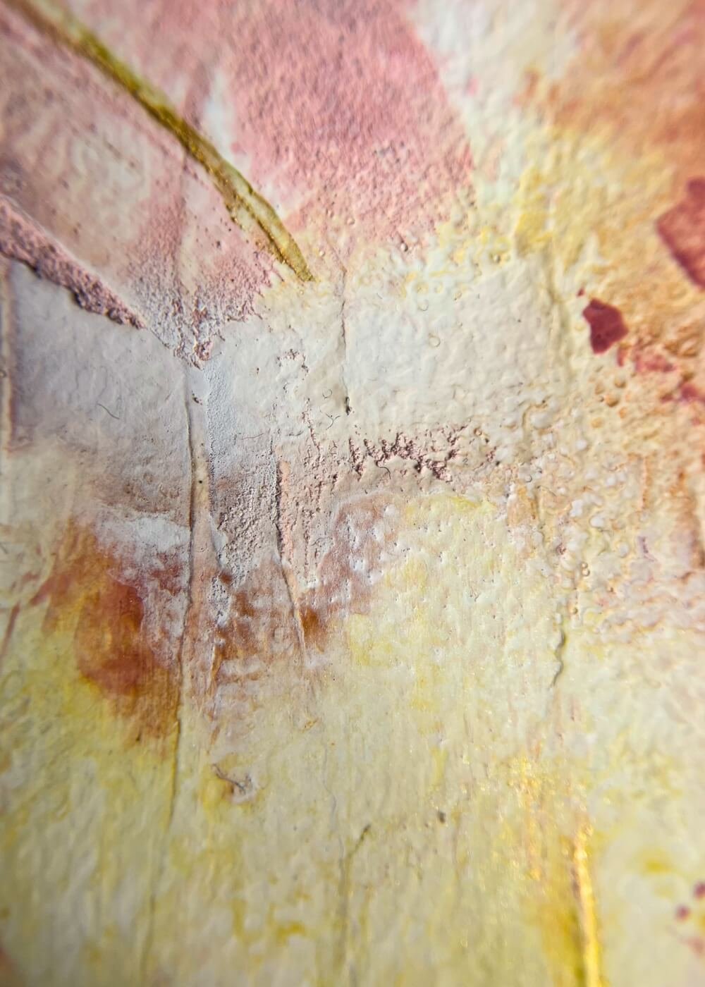 Macro view of abstract art "Held by Myself" highlighting layered textures in rosé and golden yellow with delicate surface details.