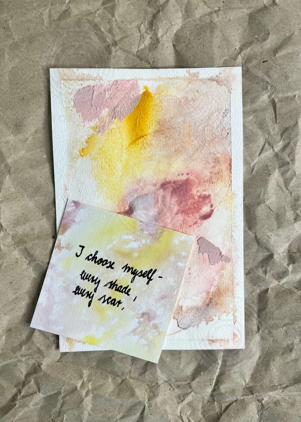 Abstract artwork “Held by Myself No. 8” with soft rose and golden textures, displayed on textured paper background alongside an affirmation card reading “I choose myself - every shade, every scar.”