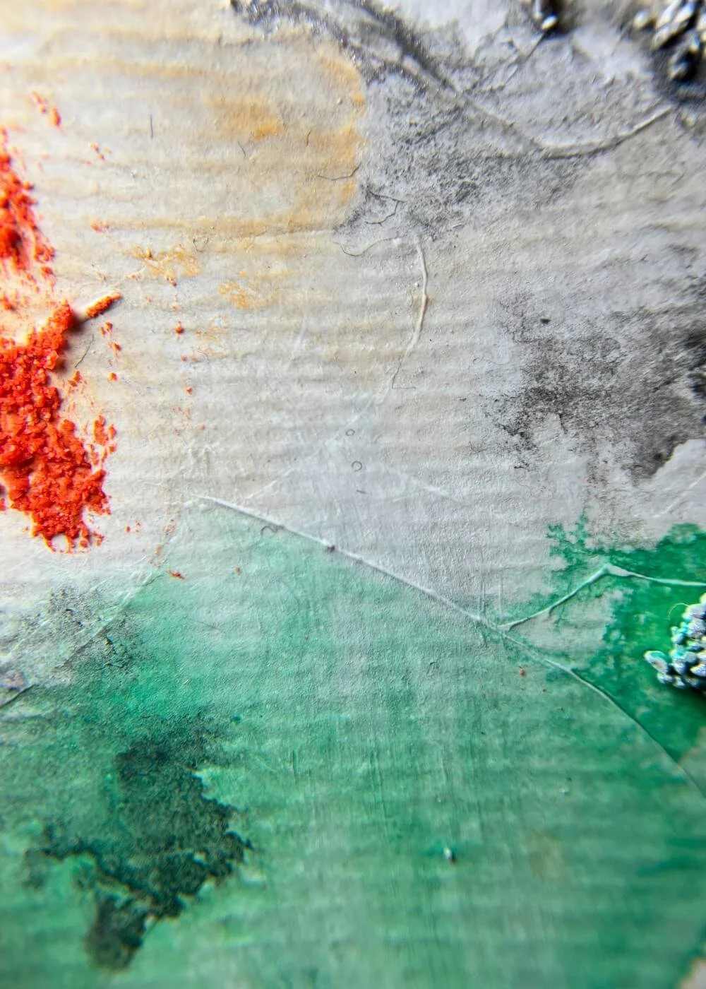 Macro detail of "The light I let in" artwork – close-up of green and grey layered surface with subtle relief textures.