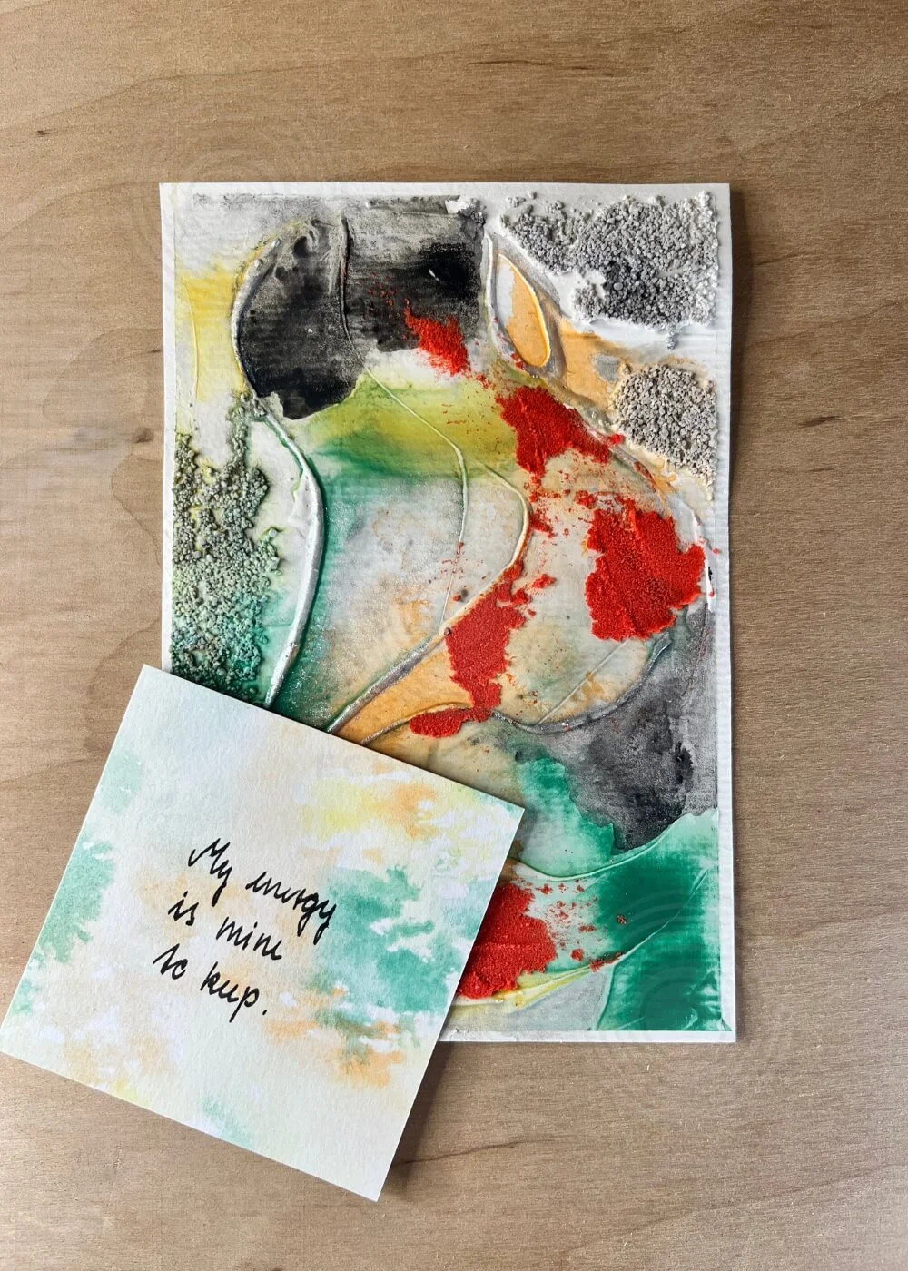 Artwork Risen through fire paired with an affirmation card reading “My energy is mine to keep”, emphasizing empowerment and resilience.