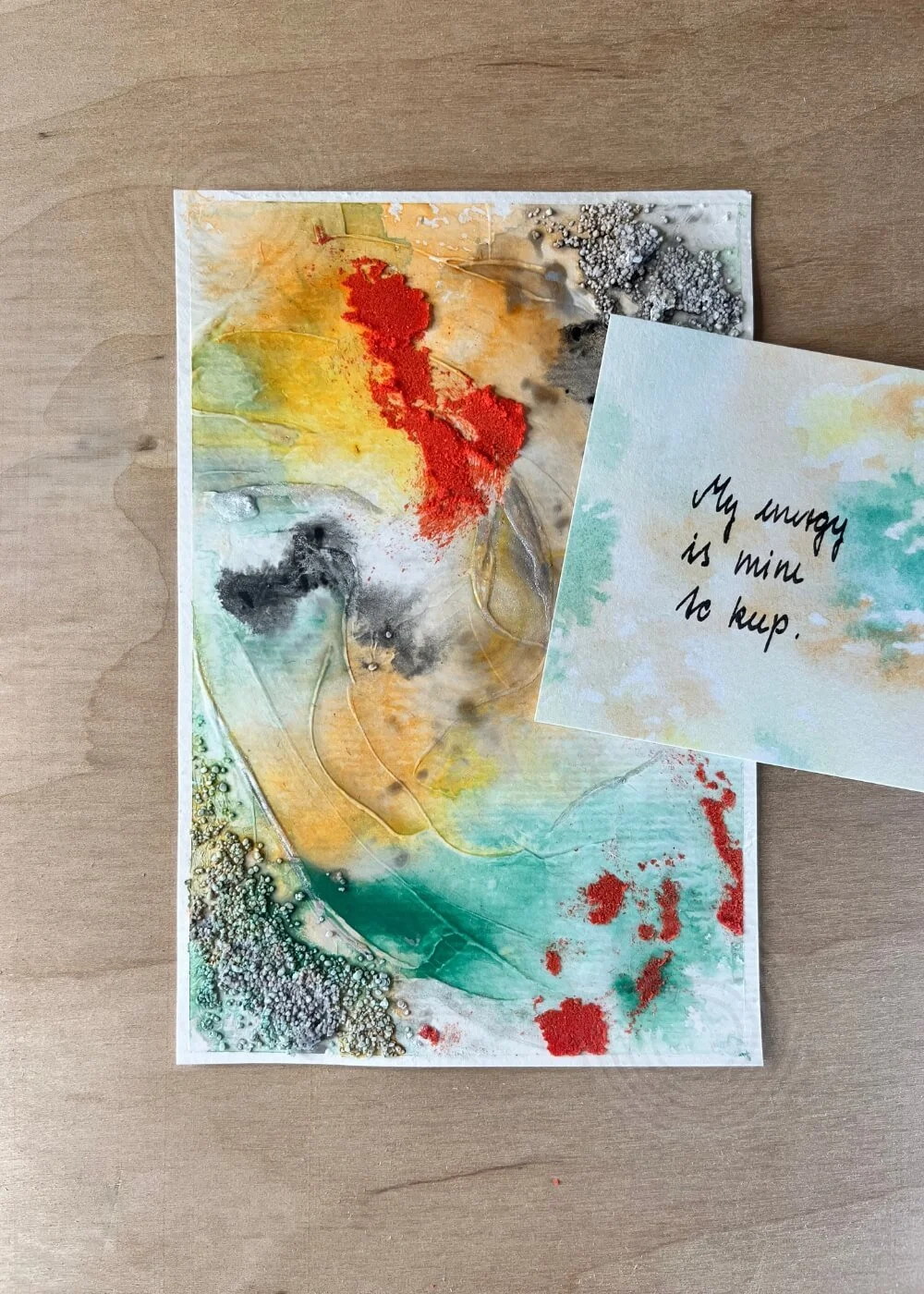 Flat lay of abstract healing artwork with affirmation card saying ‘My energy is mine to keep.’