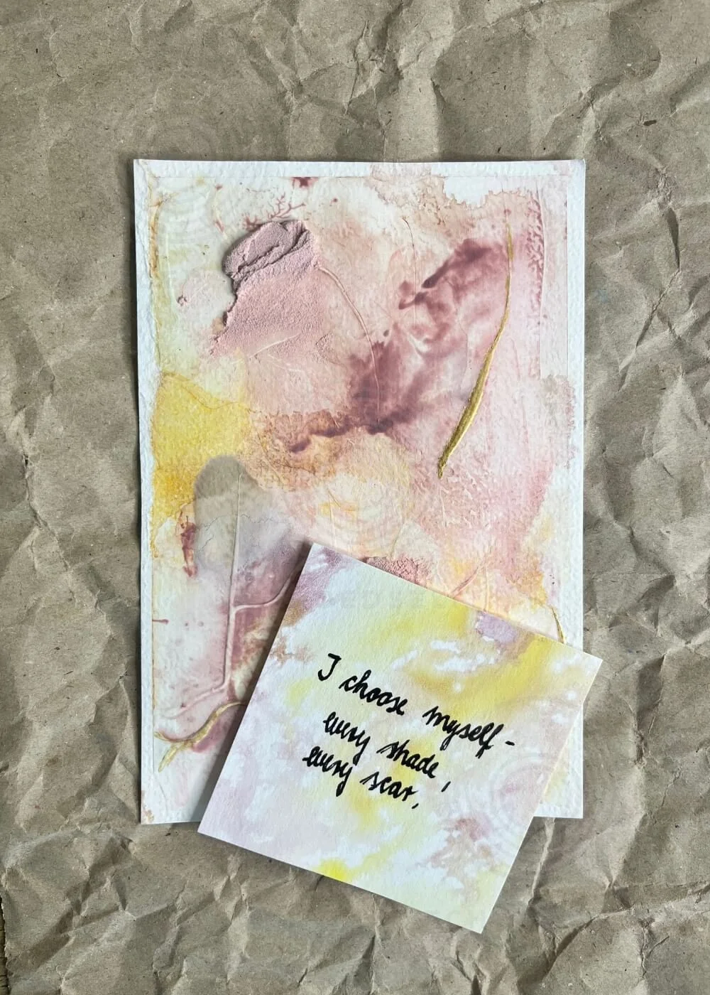 “Held by Myself No. 5” tactile artwork in rose and golden hues, paired with an affirmation card reading “I choose myself – every shade, every scar.”