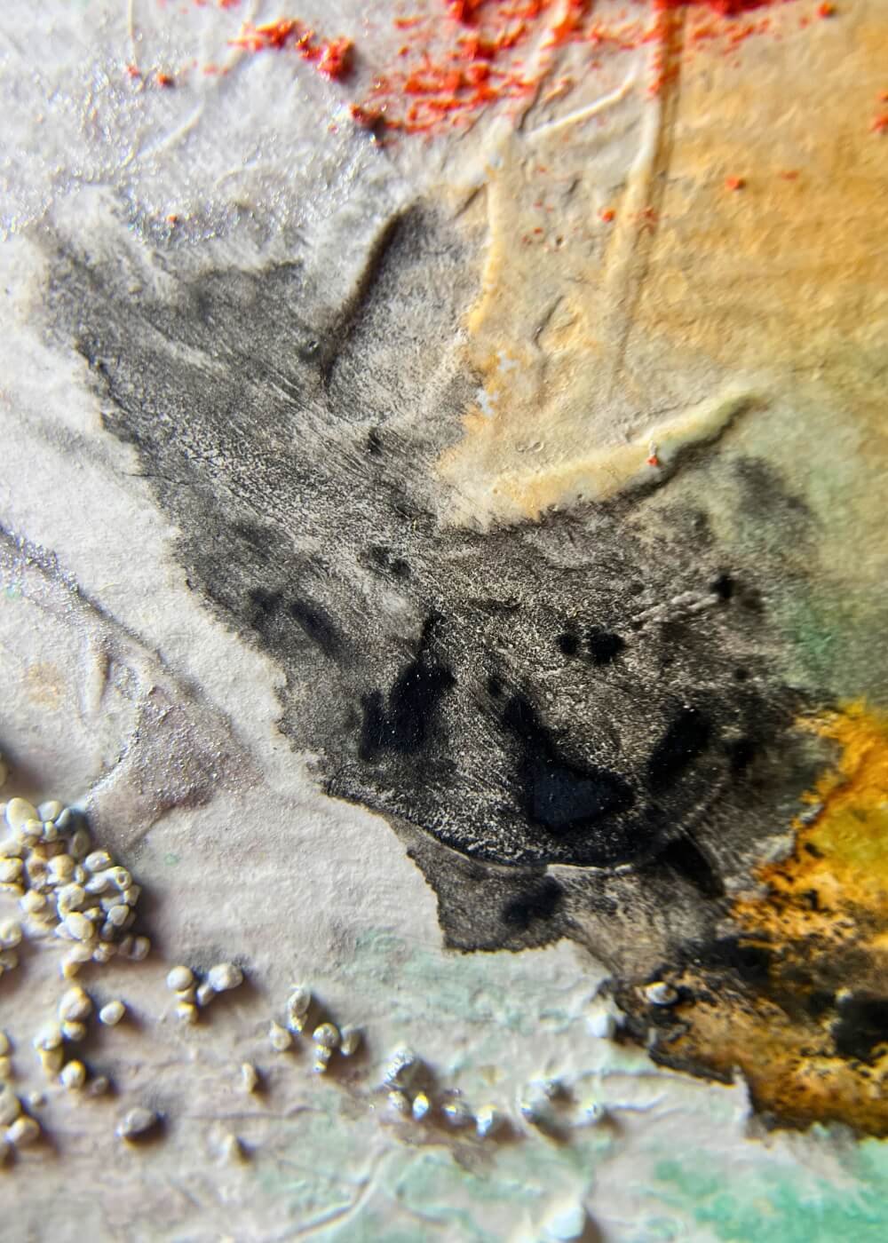 Detail shot of textured surface in “Soft shields & silent strength”, showing dark brushstrokes with grainy structure.