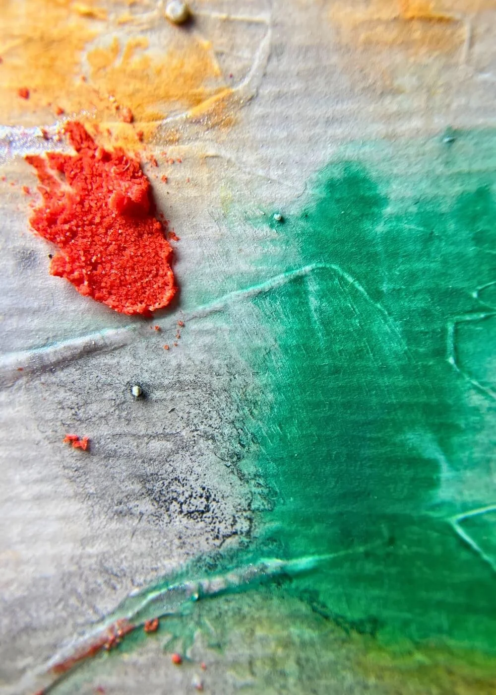 Macro detail of "The Power of Disengage" — vibrant red pigment on textured green and golden layers, highlighting tactile strength and symbolic release.