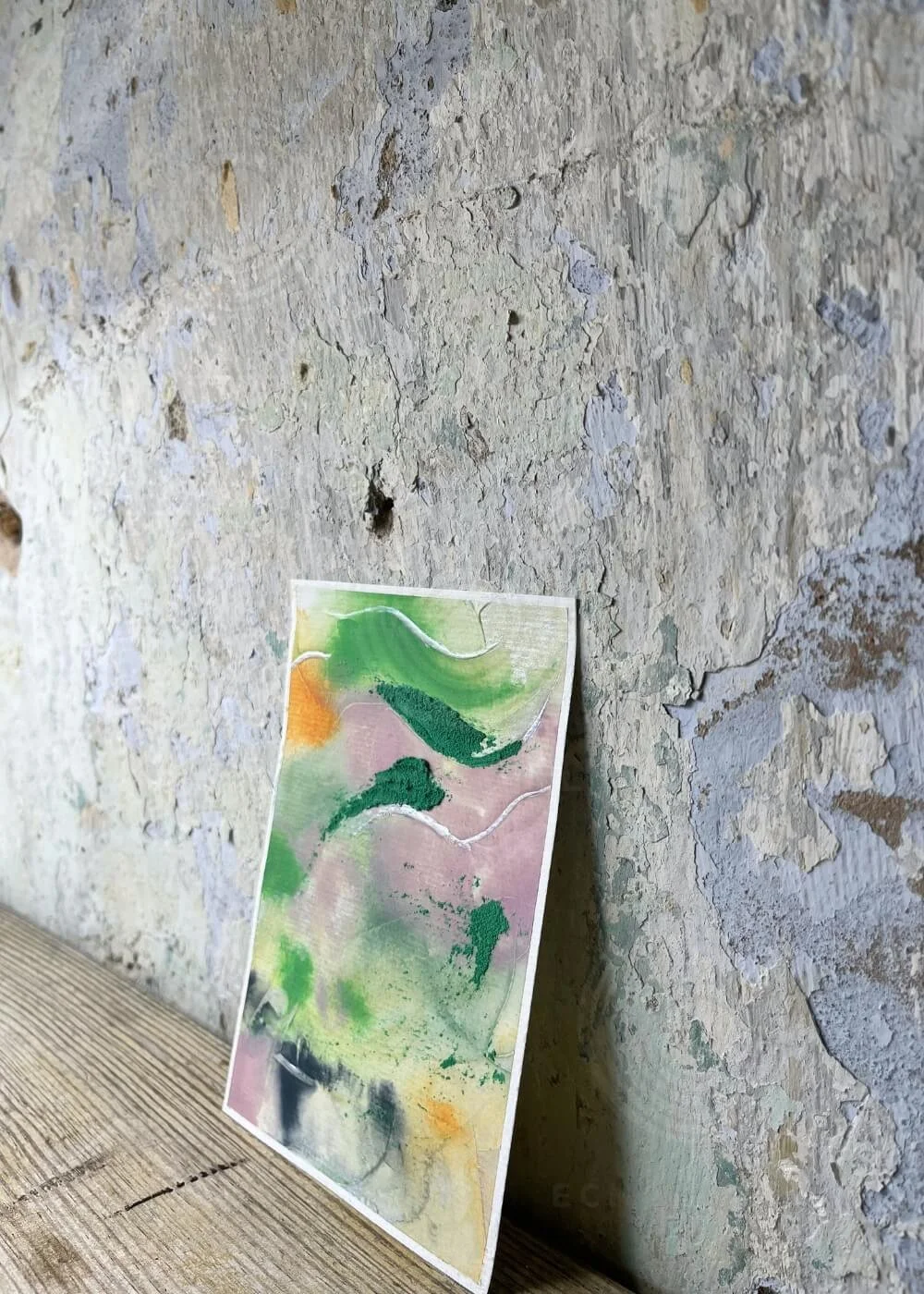 Side angle of ‘What was and what will be’, abstract mixed media artwork in flowing shades of green, violet, and soft orange, part of the Silver Feathers Rising healing art collection.
