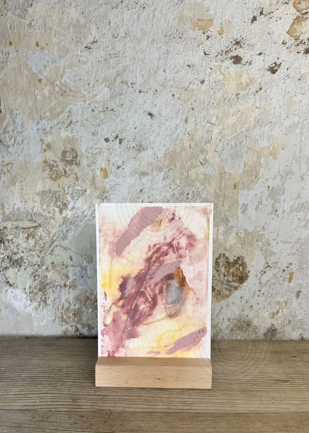 Abstract mindfulness artwork No. 4 with layered textures in soft pink, yellow, and deep earthy hues, part of the “Held by Myself” healing series.