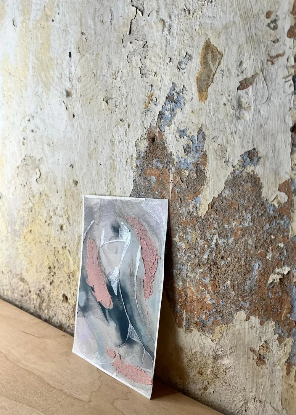 Side-angled view of “A whisper of tomorrow” showing soft texture layers and matte pastel surfaces on natural background, evoking quiet introspection.