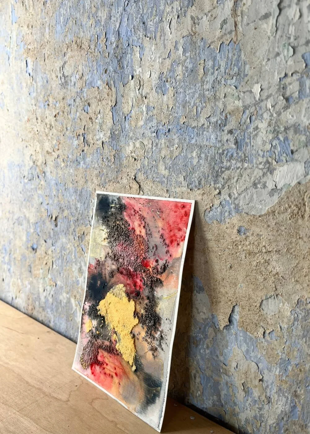 Leaning gently to the side, the painting breathes warmth into stillness — as if silence itself began to smolder.