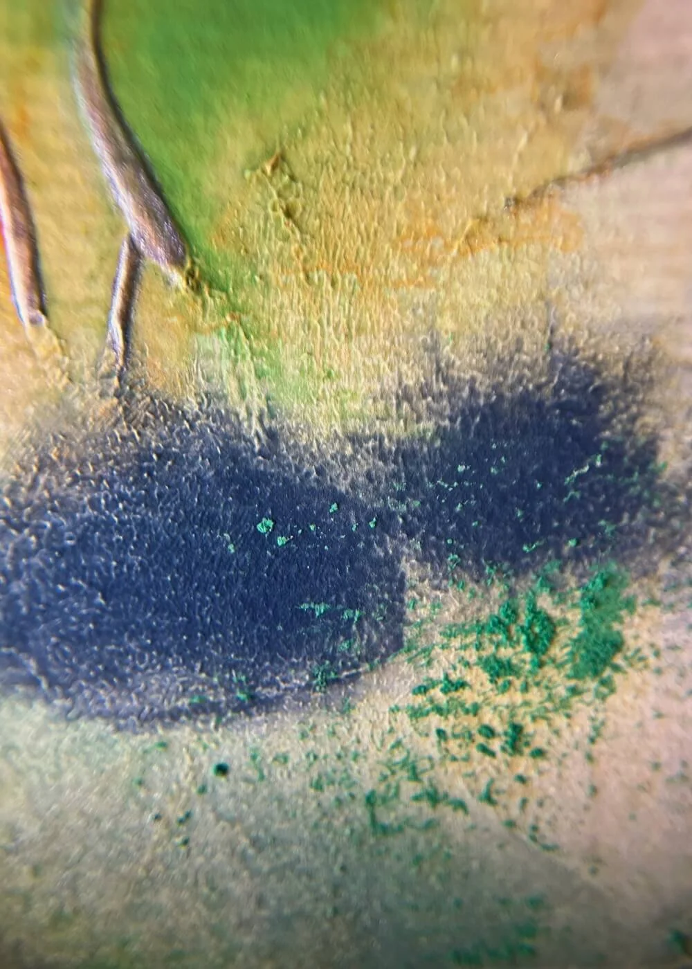 Close-up of deep blue pigment blending into green in ‘Where silence whispers of freedom’, abstract artwork representing silence, release, and spiritual awakening.