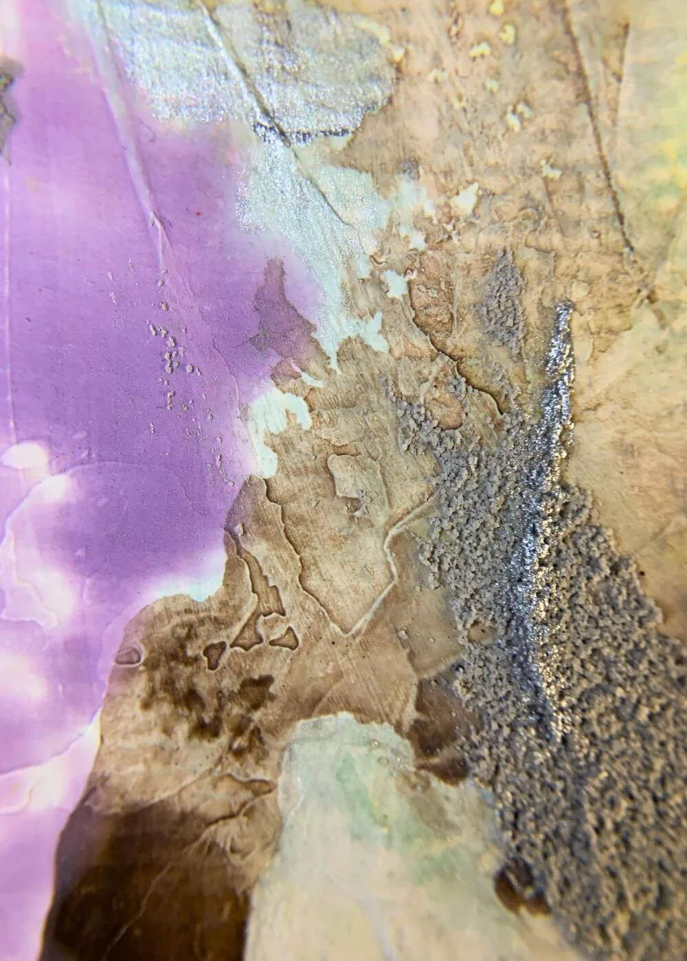 Macro detail of abstract artwork "Between the Seconds No. 7" showing yellow field with soft pink accent and green textured line.