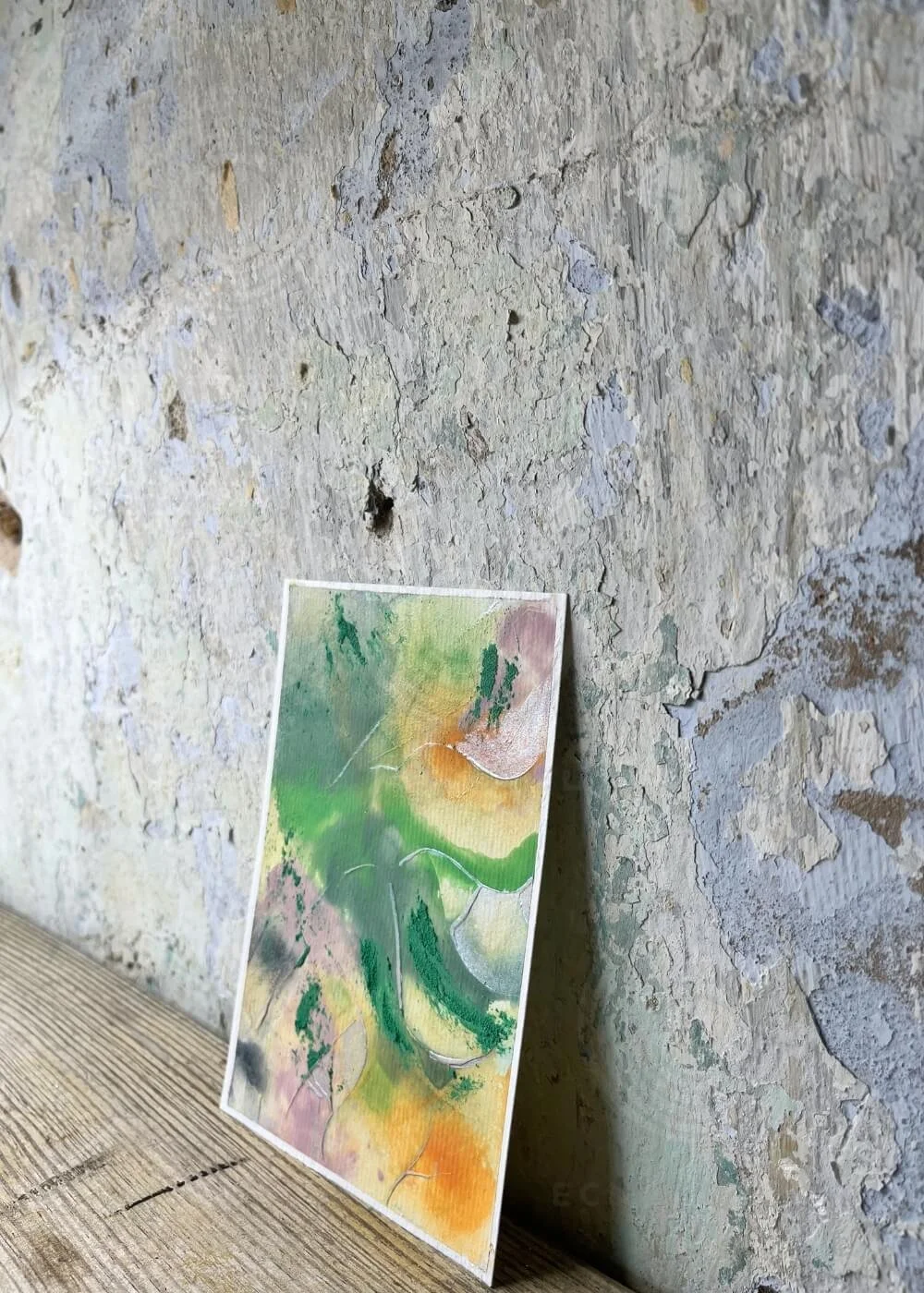 Textured abstract painting I have arrived photographed at an angle, highlighting depth, brushstrokes, and layered colors.