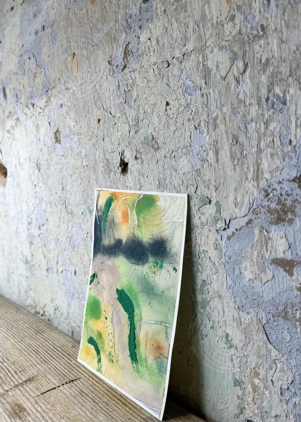 Side angle of ‘Where silence whispers of freedom’, abstract healing mixed media artwork with flowing textures in green, blue, and golden tones, part of the Silver Feathers Rising collection.