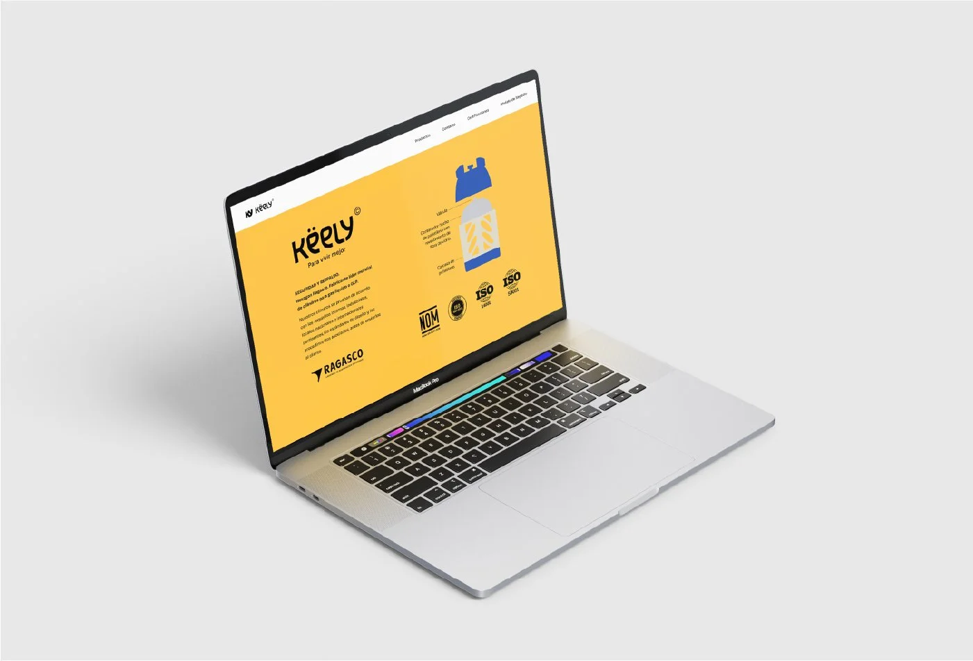 Laptop plata con pantalla que muestra una página en color amarillo promocionando productos de la marca Keely.
