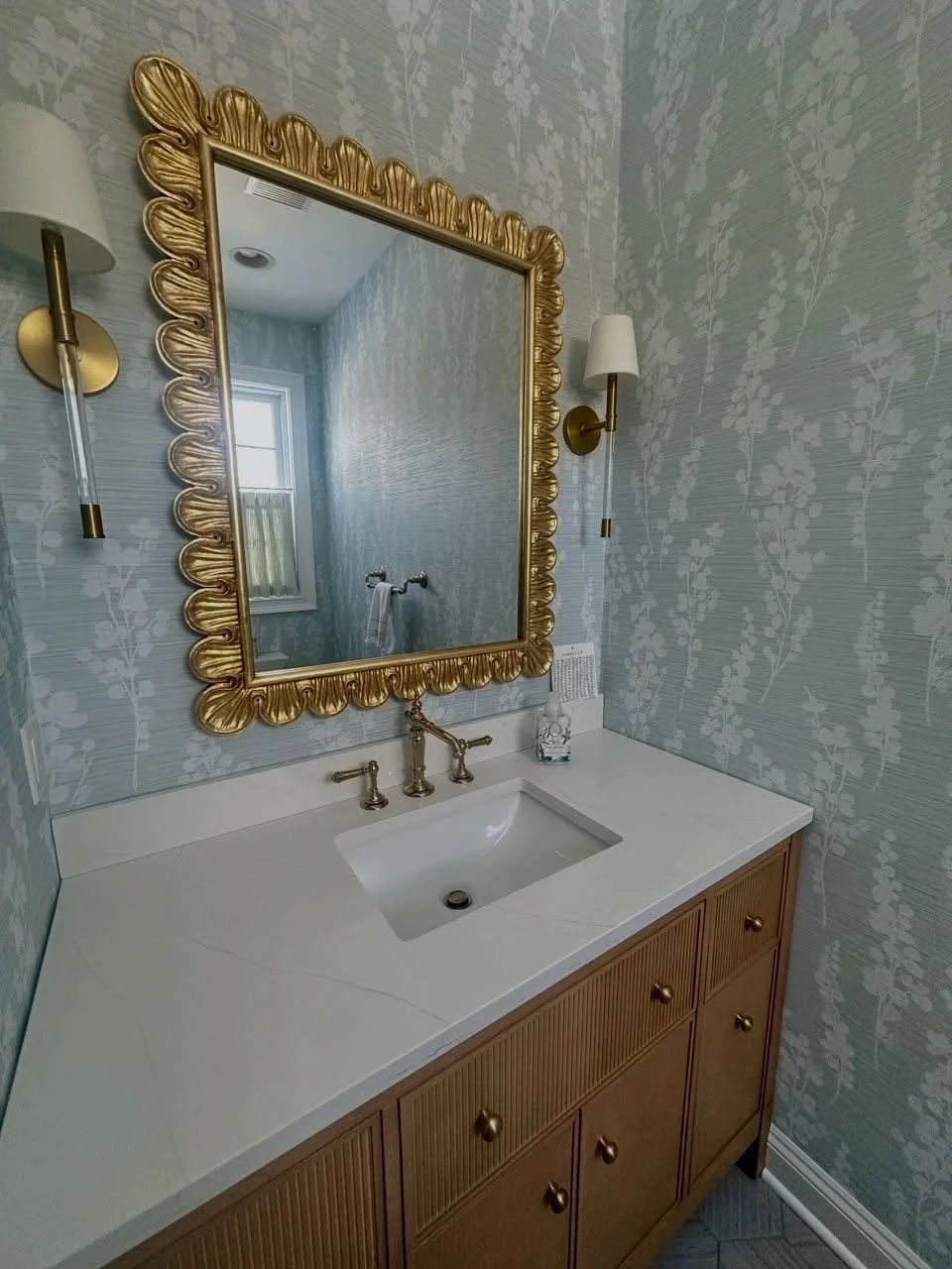 Small space, big transtormation ✨
We added wallpaper, a new mirror, vanity, plumbing, &amp; tile to completely refresh this space and the difference says it all.
Swipe for the before...