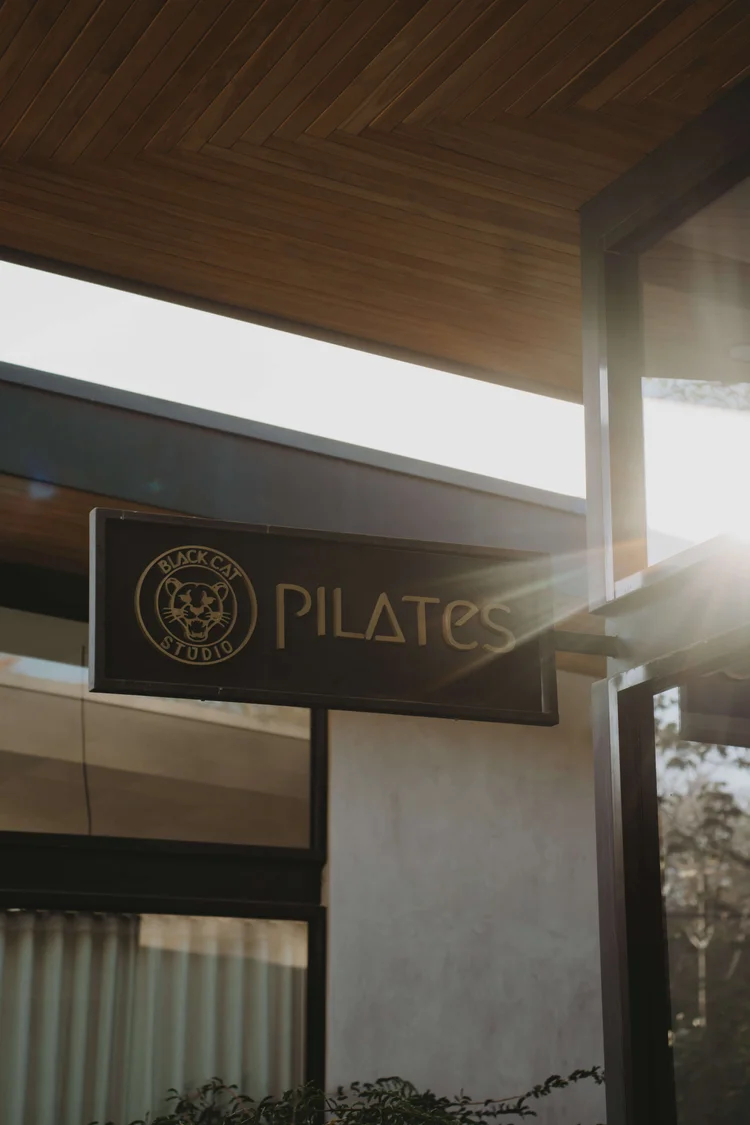 Black Cat Studio Pilates sign in Guiones