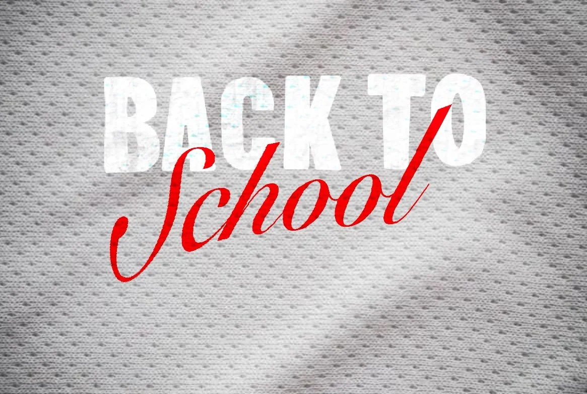 Text graphic with the words 'Back to School' written in white and red font on a textured gray background.