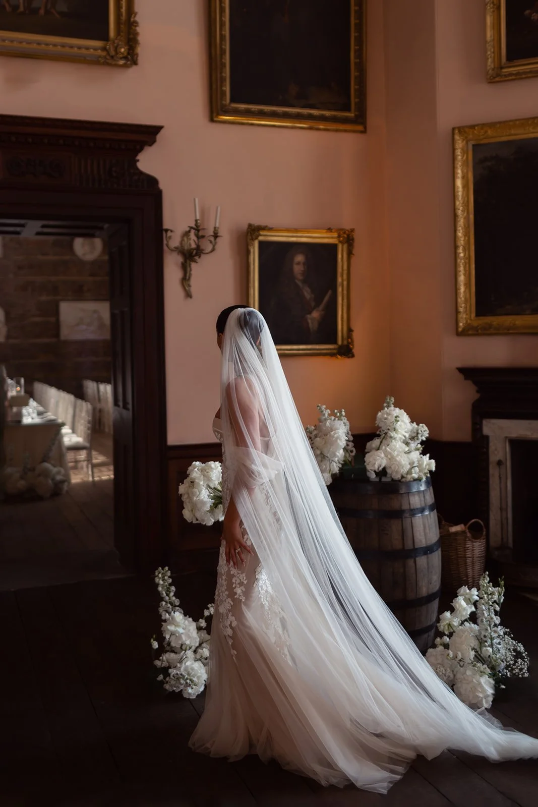 gosford-house-bride-with-white-floral-wedding-flower-diaplays.jpg