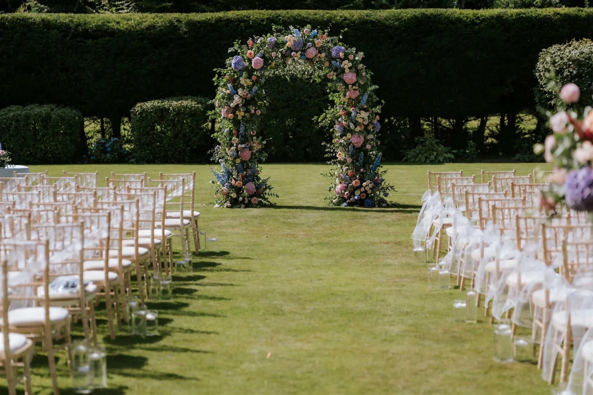 wedding-ceremony-outdoor-flower-arch-pastel-.JPG