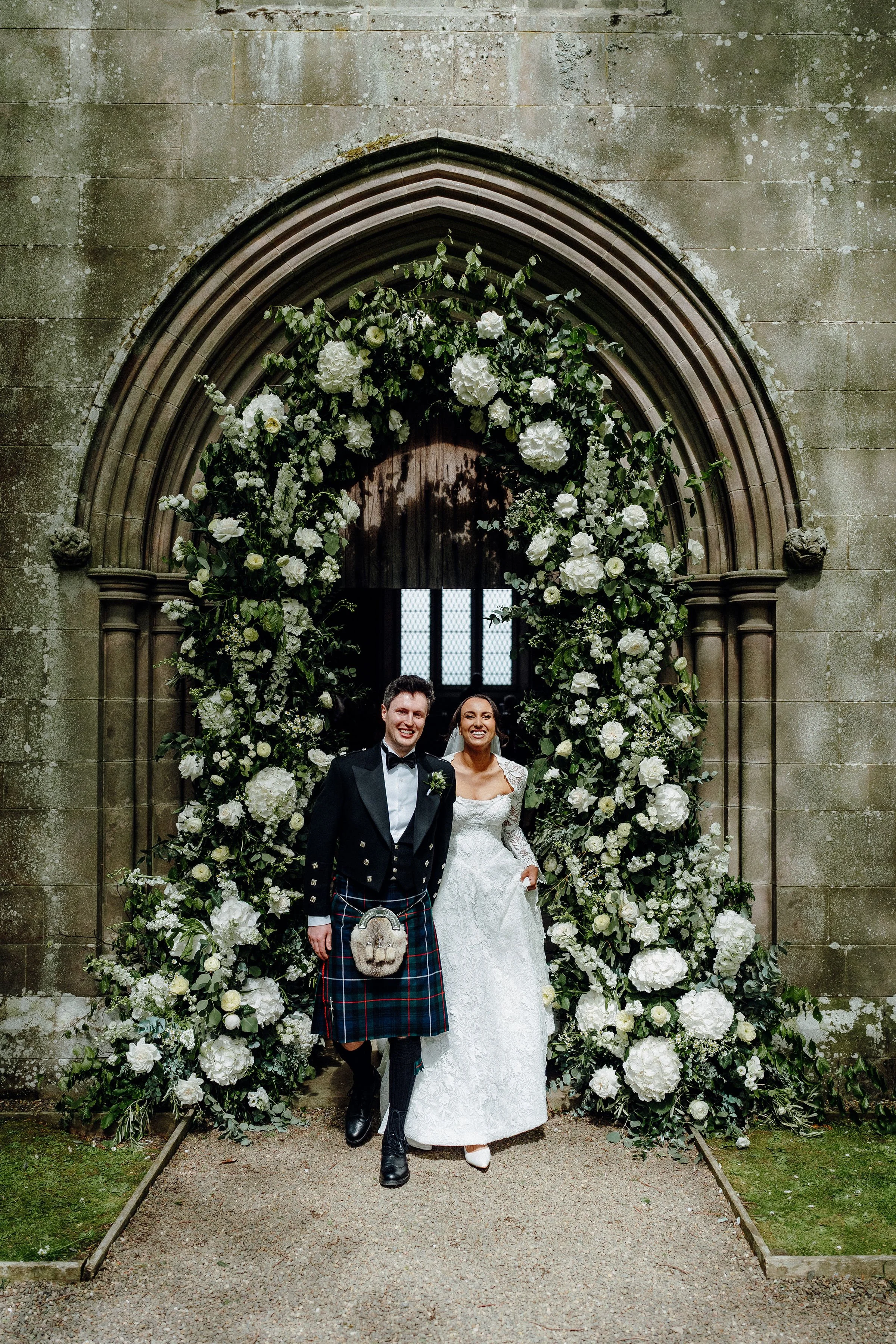 floral-church-arch-rosebury-estate-wedding.jpg