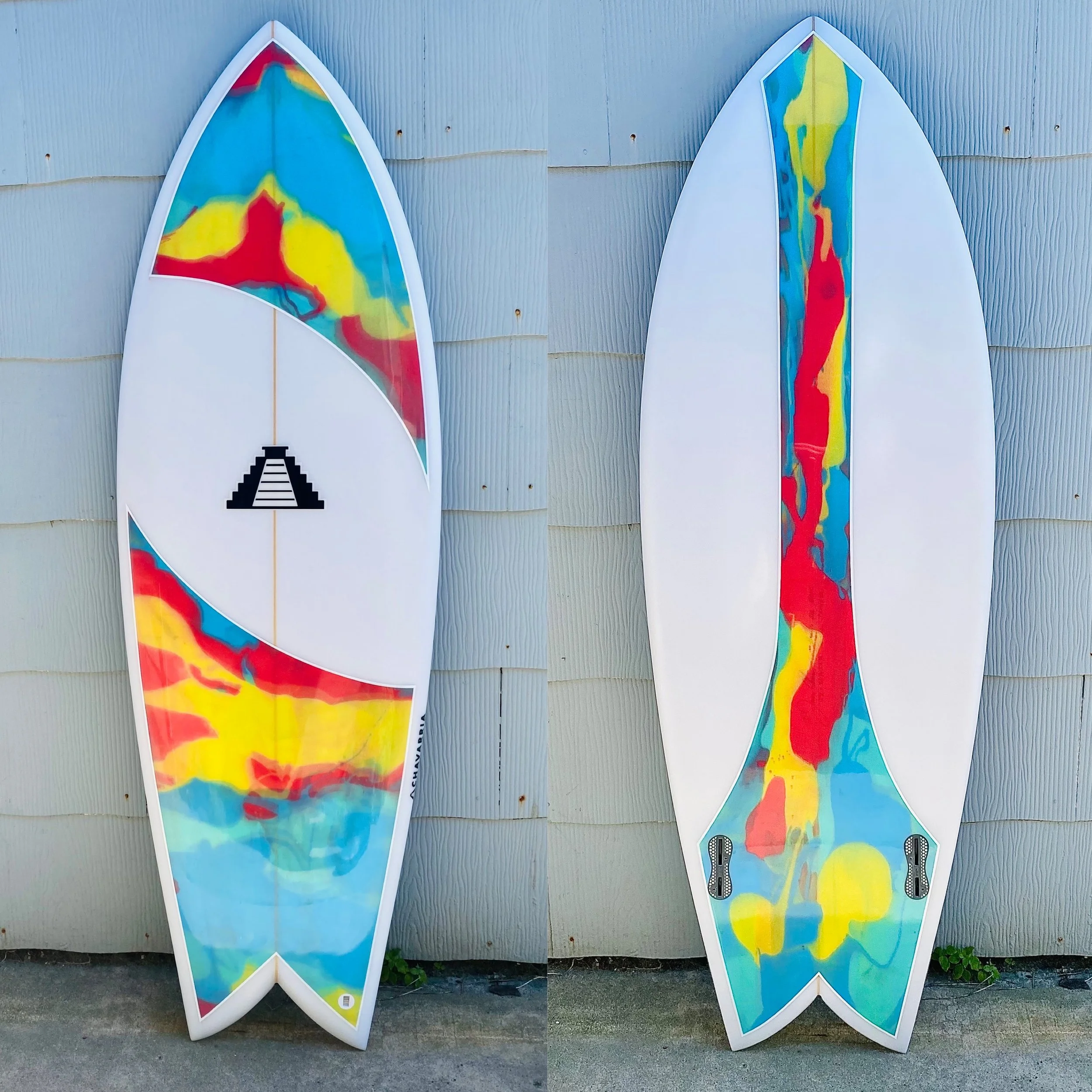 custom fish surfboard with blue red yellow green resin abstract art