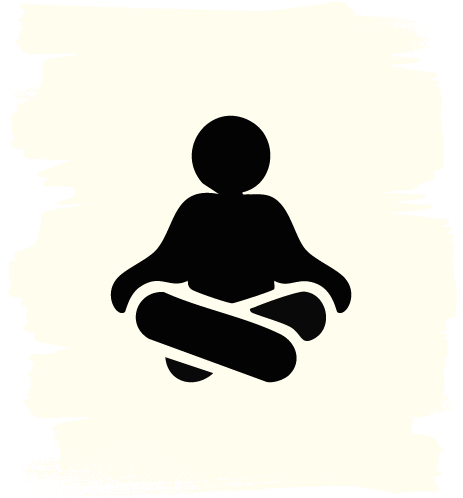 Silhouette of a person doing guided yoga at home, sitting cross-legged in a meditative pose.