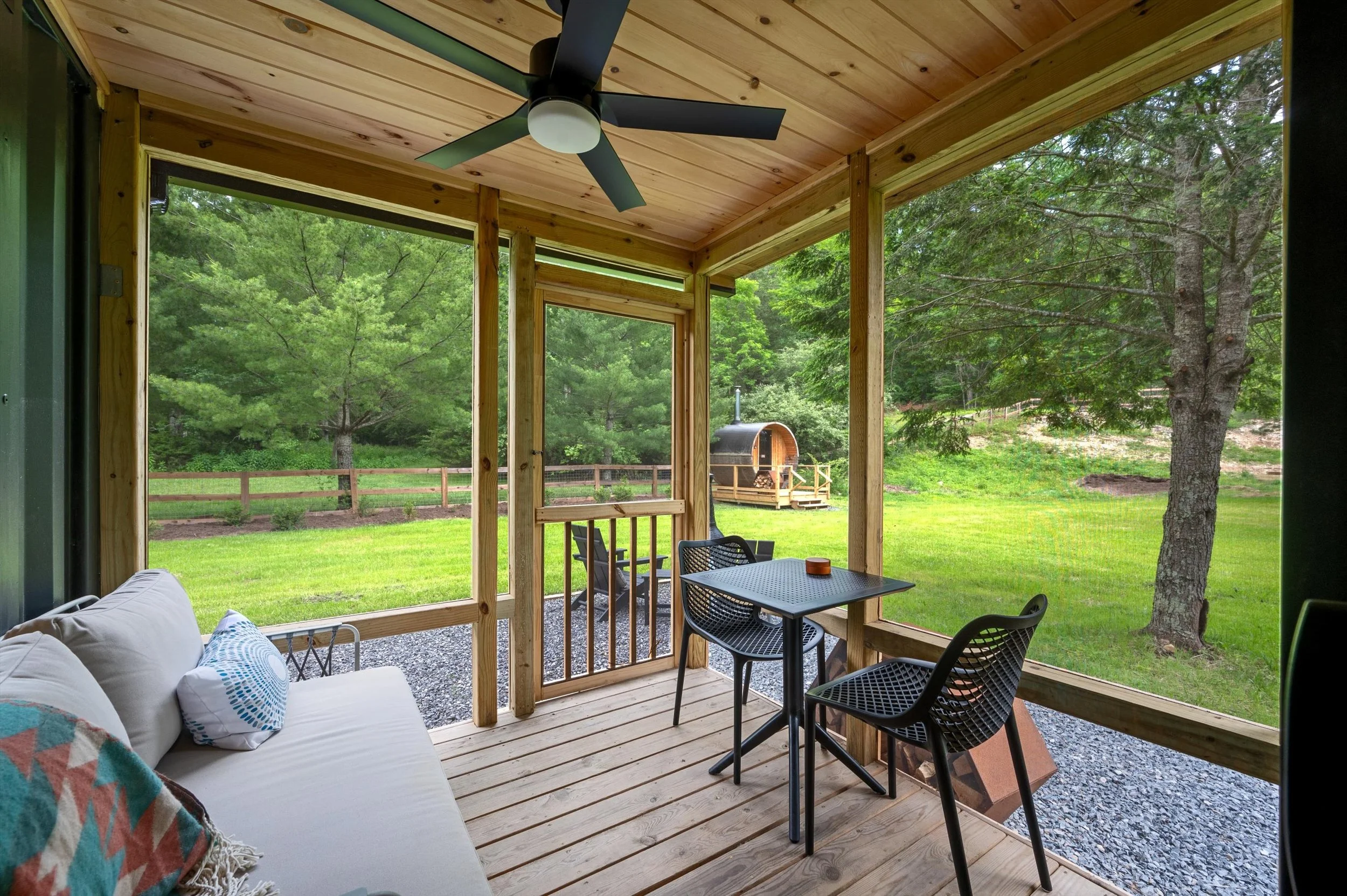 087-Idea, screened in porch, sauna in background . web.jpg