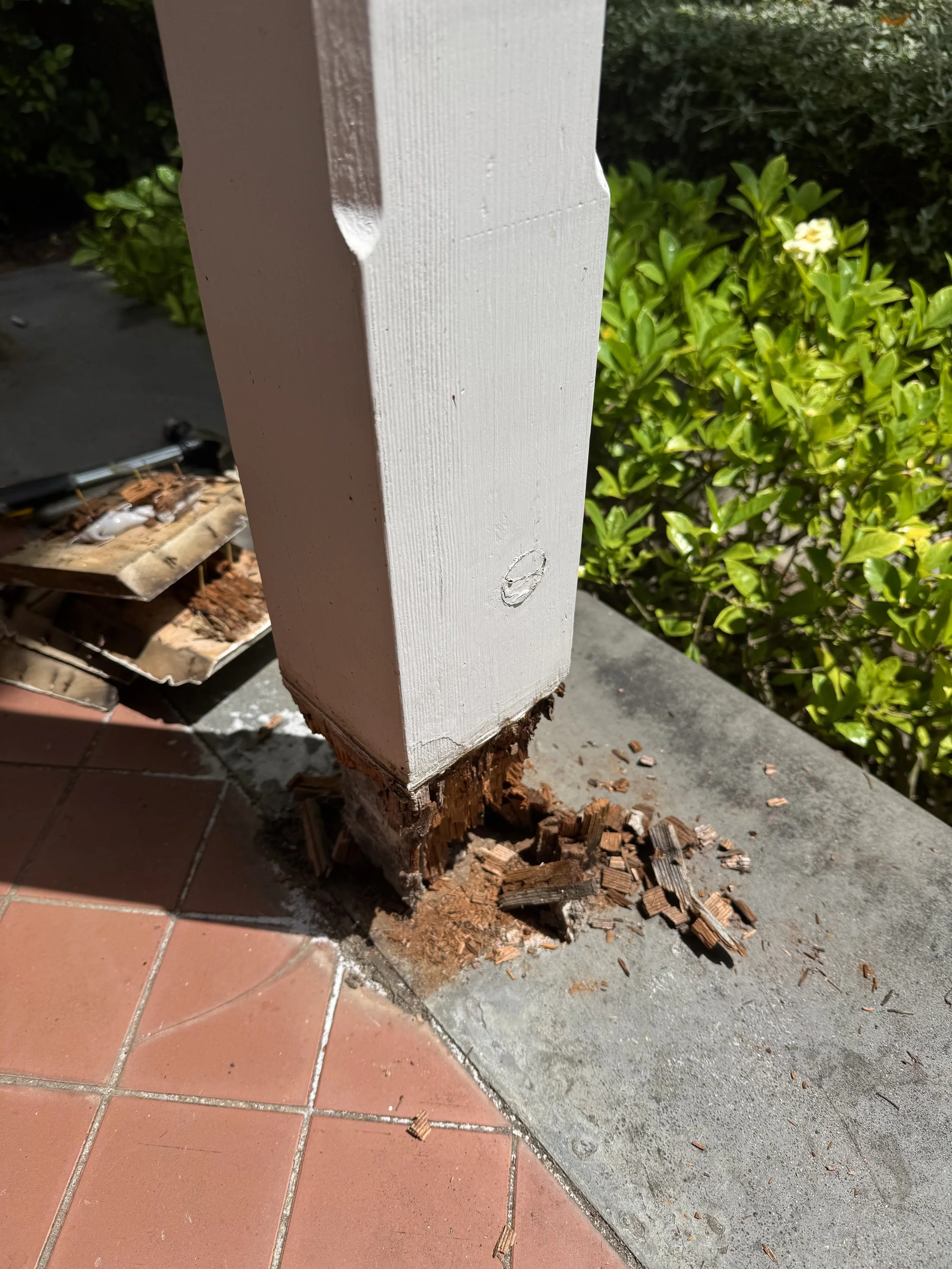 Rotted verandah posts replaced and raised to help prevent water ingress and reduce the risk of future rot.