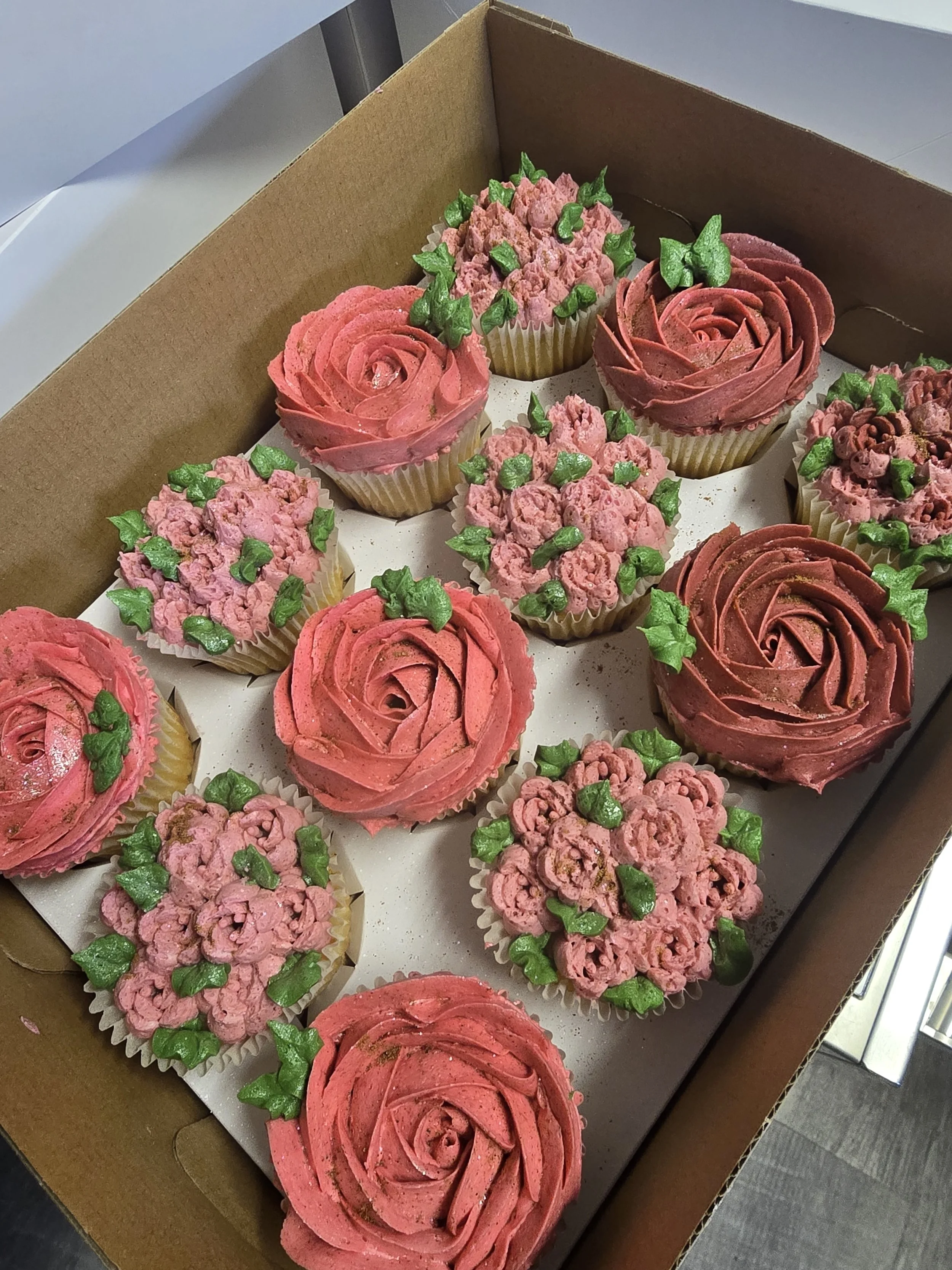 Pink baby shower cupcakes.jpg