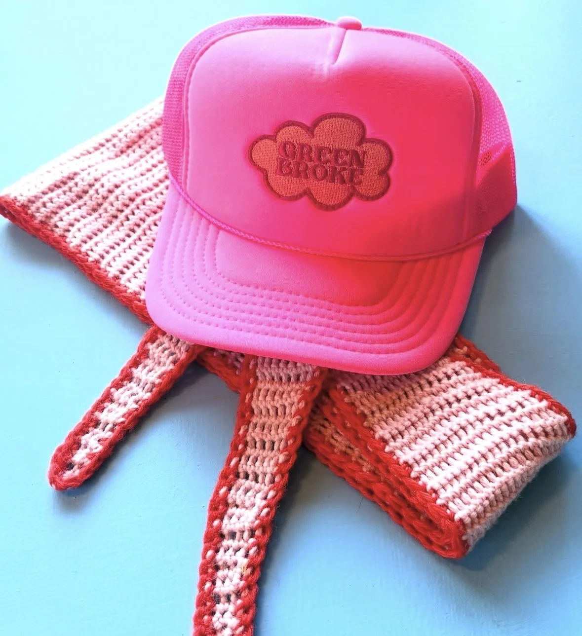 green broke trucker hat