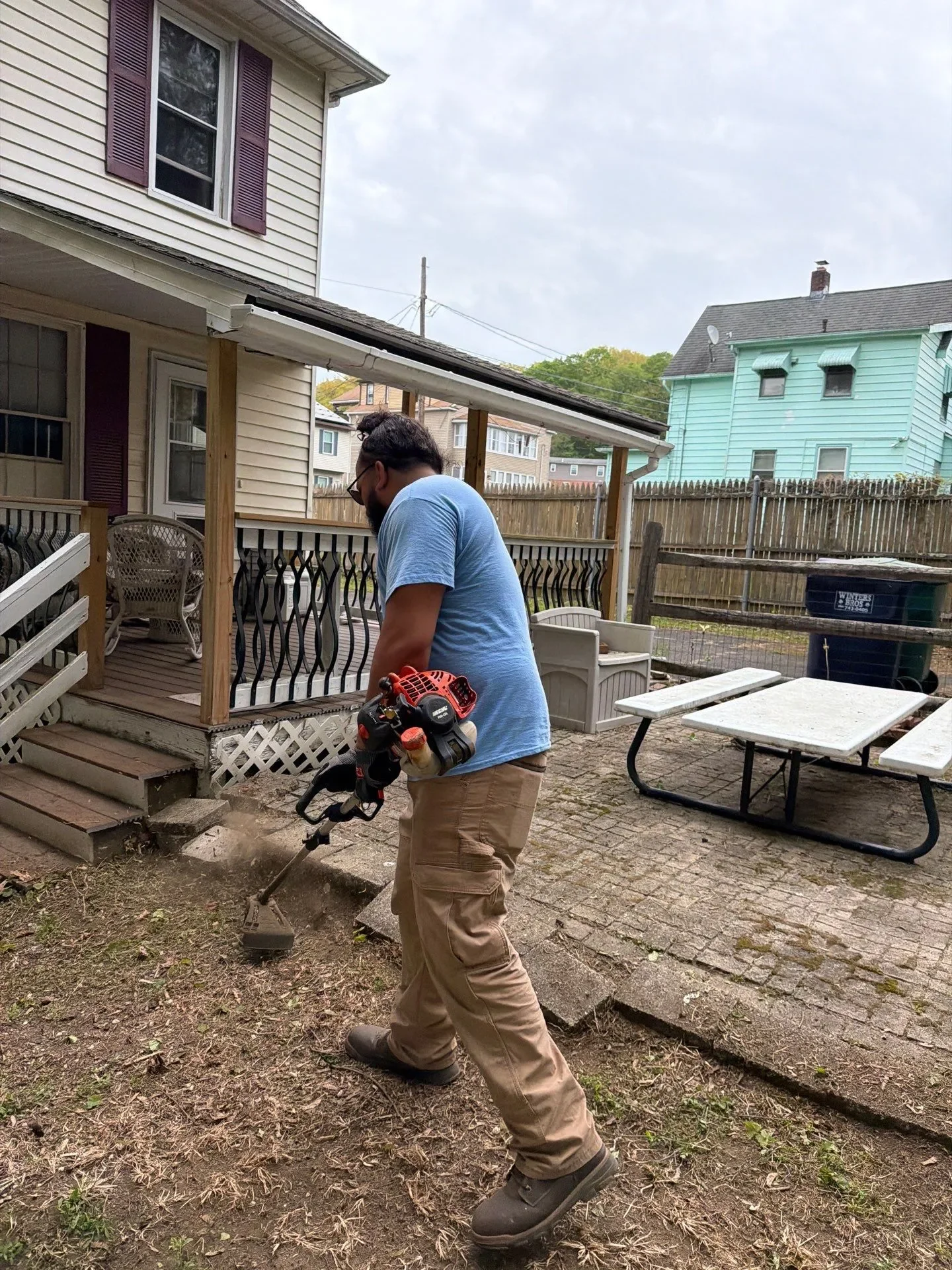 General home repair services in Connecticut, handyman using Makita drill for property maintenance