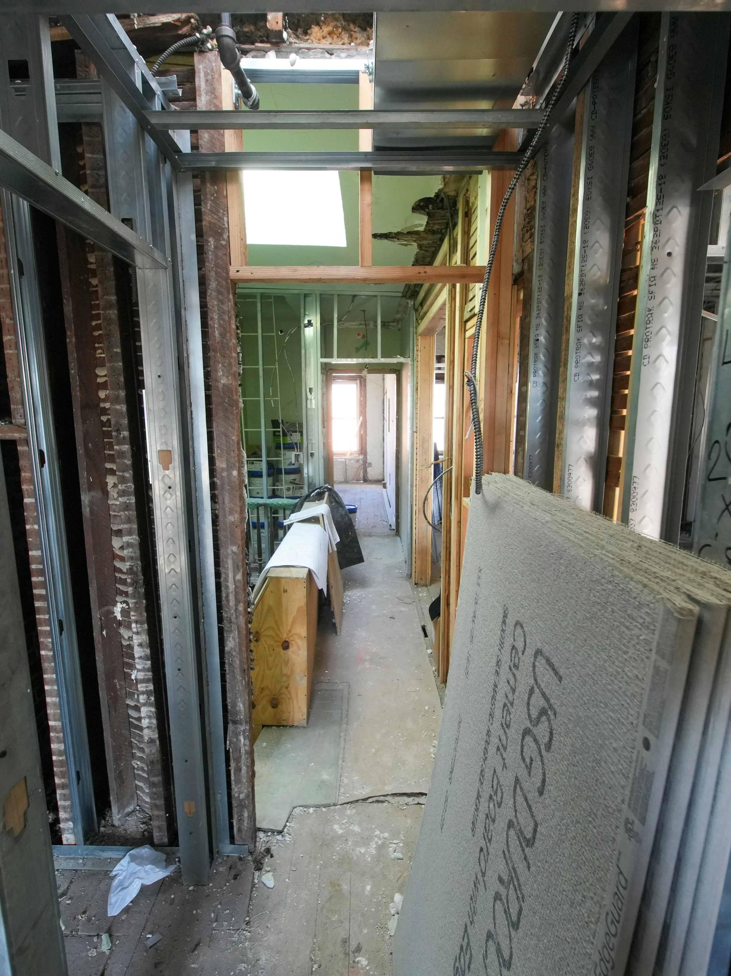 Bathroom remodeling project in progress in New Haven, CT with framing and drywall installation