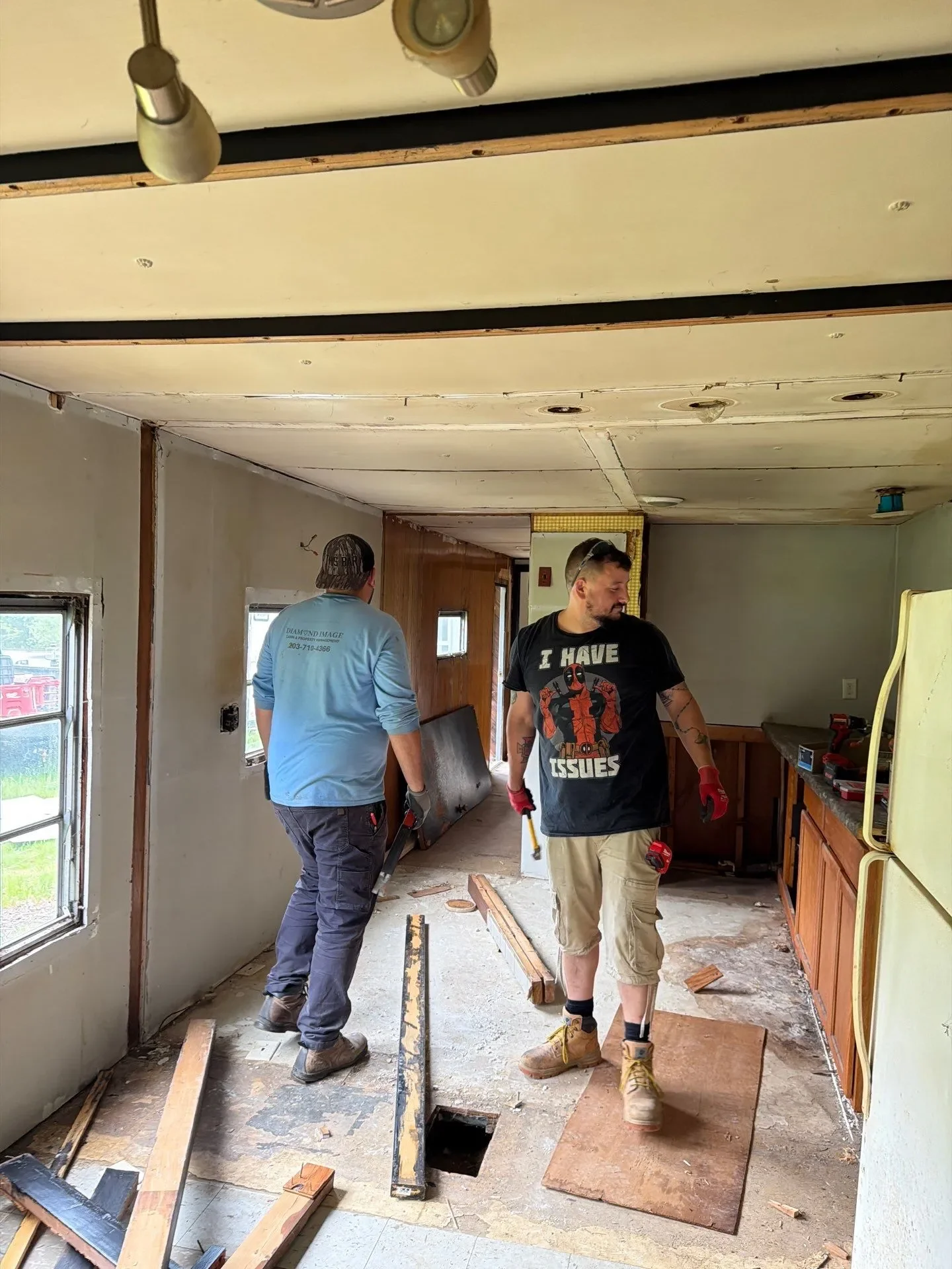 Diamond Image LLC crew member during whole home remodel demolition phase in Connecticut